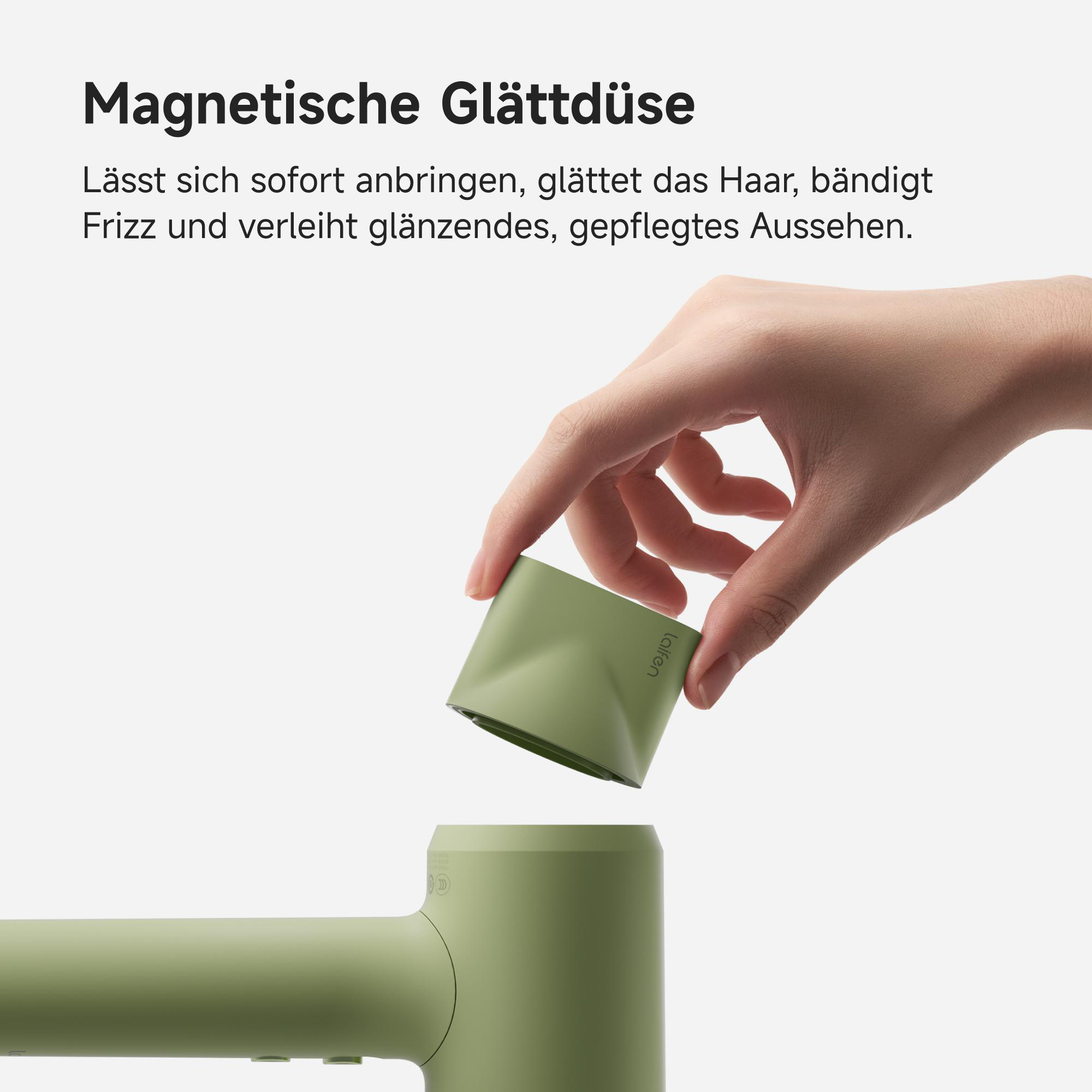 Hand, die einen grünen Haartrockneraufsatz hält. Text lautet 'Magnetische Glättdüse' und beschreibt Vorteile.