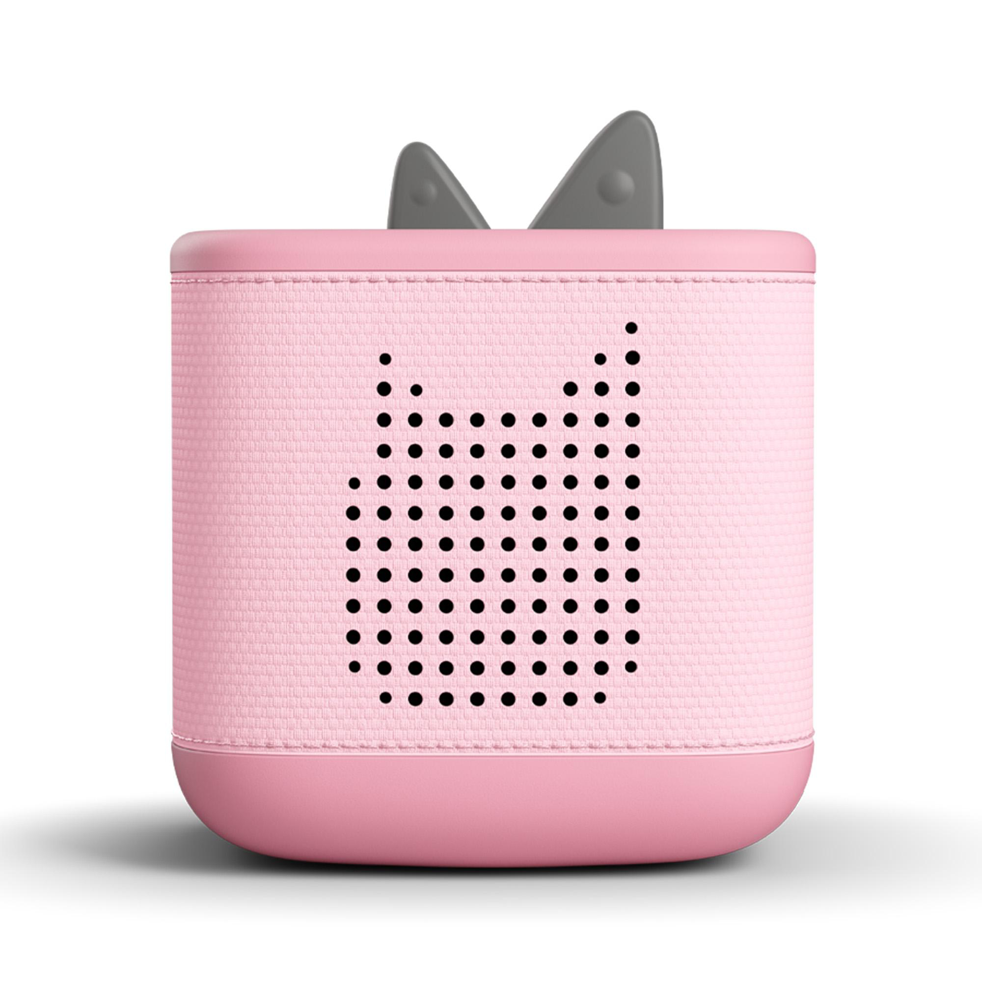 Ein rosa würfelförmiger Lautsprecher mit Katzenohren. Die Vorderseite hat ein Muster aus schwarzen Punkten. Zwei graue Ohren sind oben.