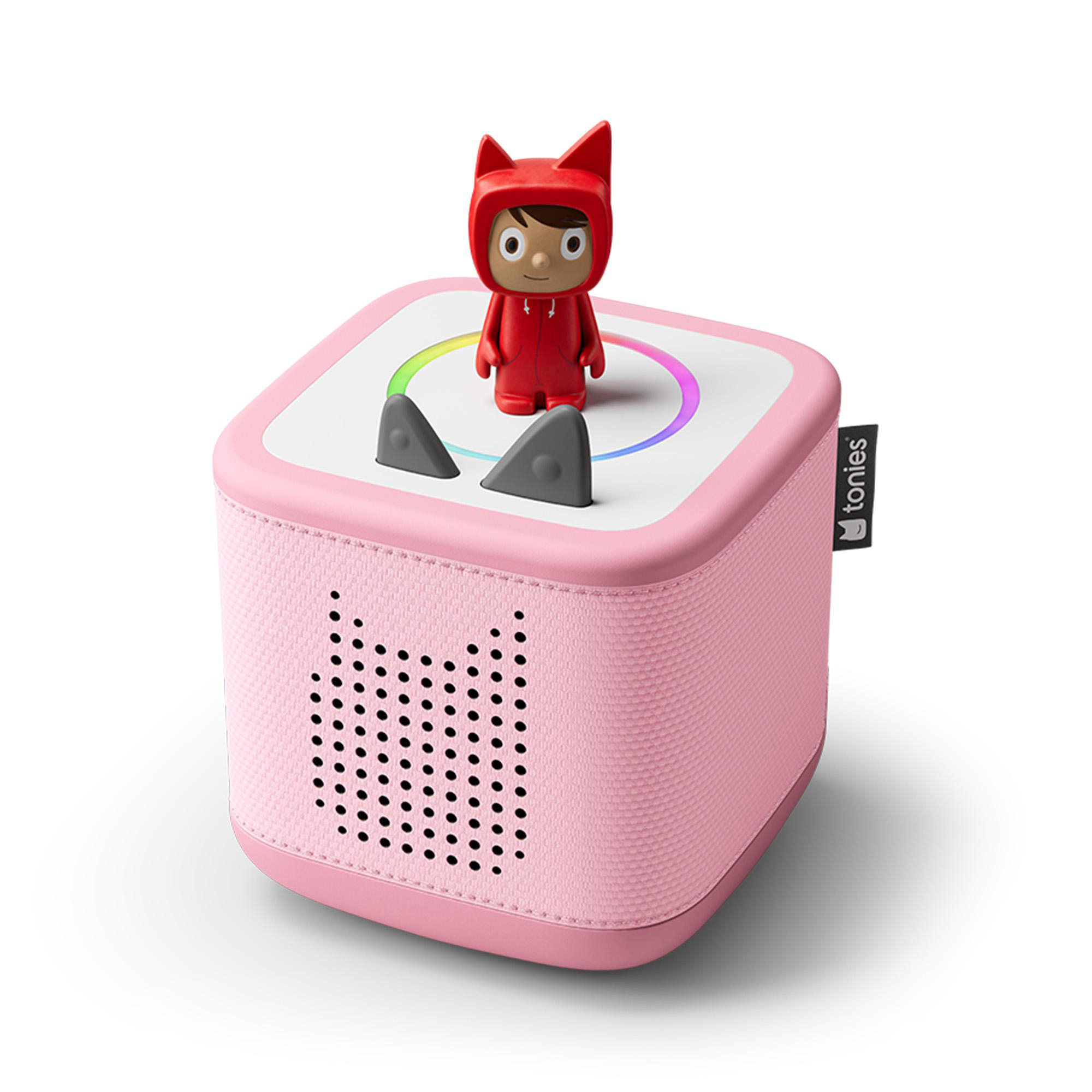 Ein rosa Würfel-Lautsprecher mit einer Figur mit Katzenohren oben. Der Würfel hat ein Lautsprechergitter und den Markennamen 'tonies'.