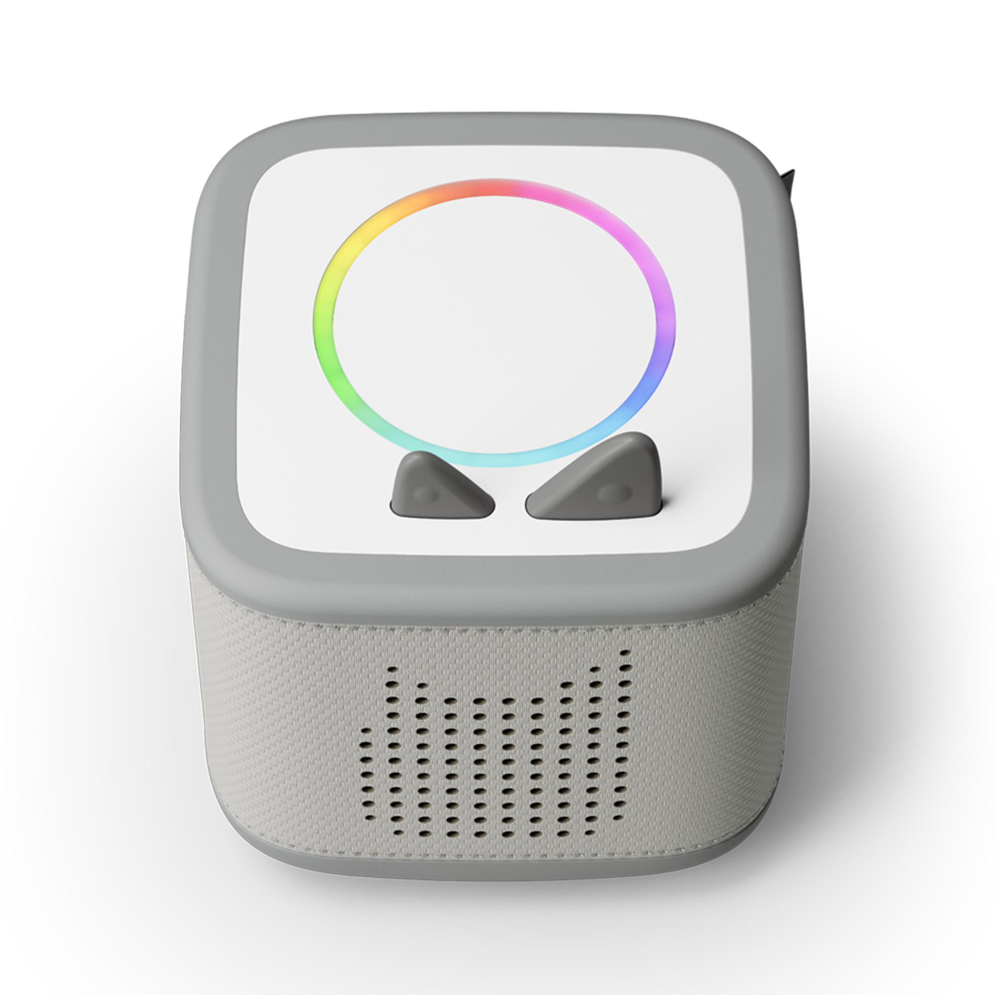 Ein grauer Lautsprecher mit einem Regenbogen-Lichtring, zwei grauen Knöpfen und einem Lautsprechergrill. Es ist auf weißem Hintergrund.