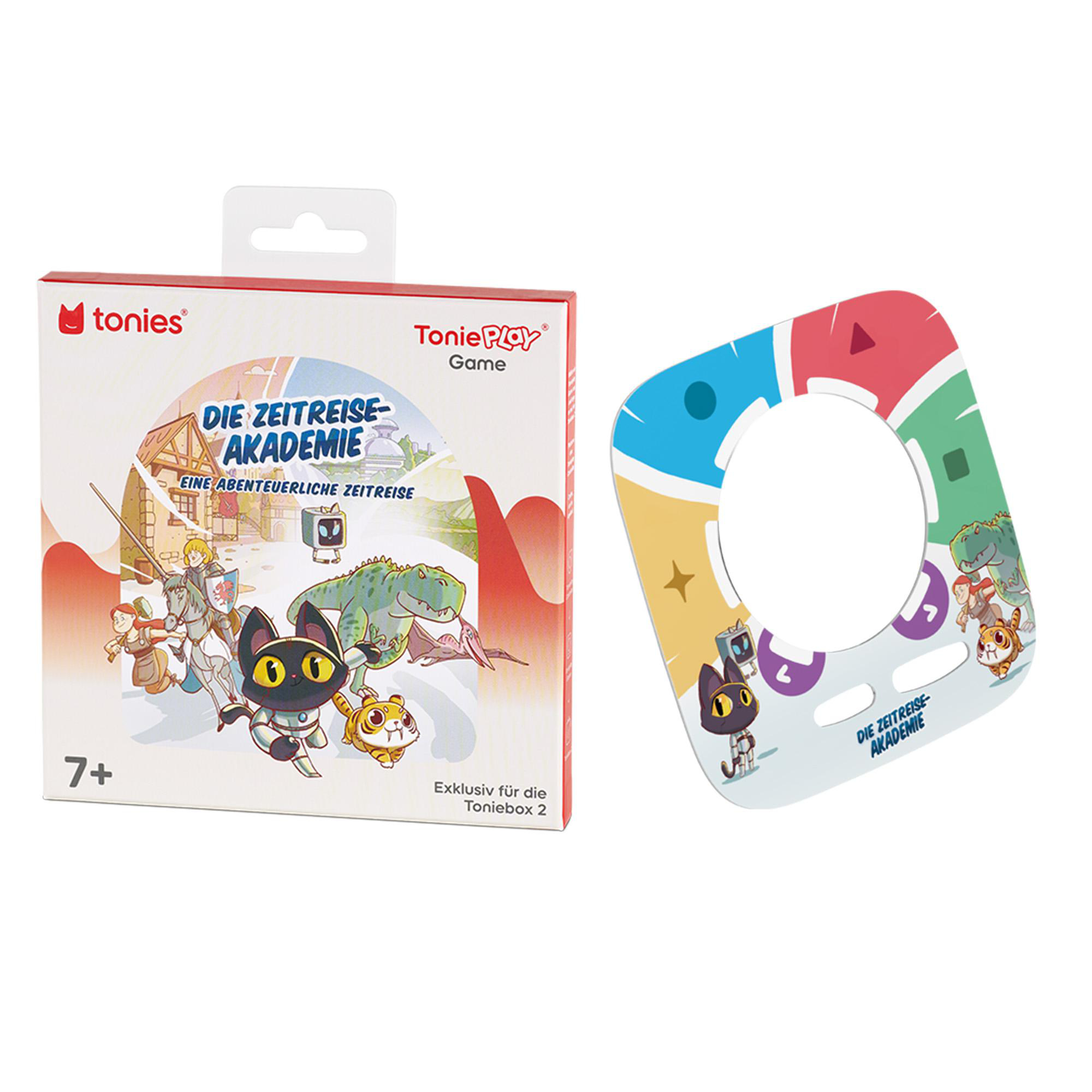 Eine Toniebox-Spielbox und ein Spielstein. Die Box hat Zeichentrickfiguren. Der Spielstein hat eine Ringform mit Zeichentrickfiguren.