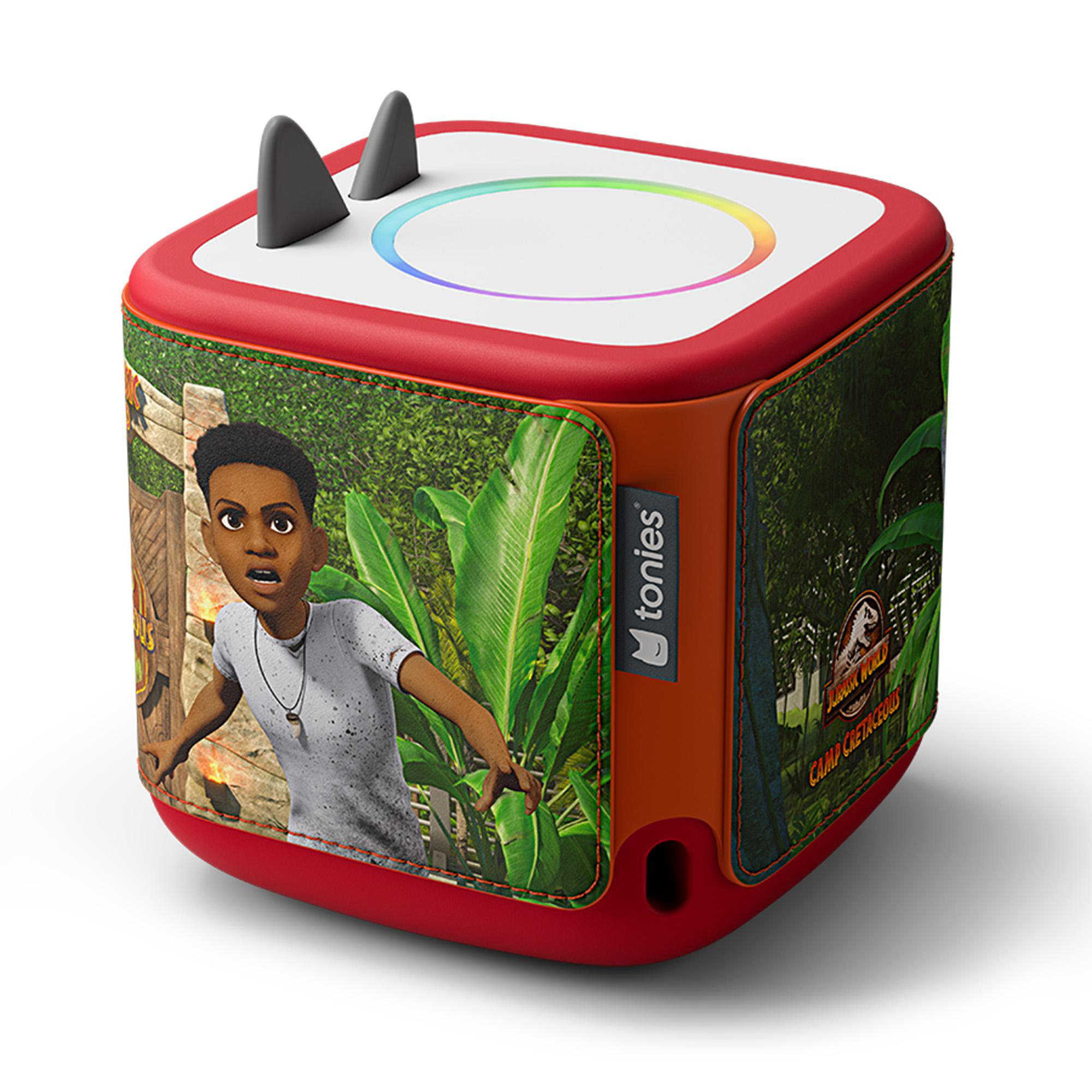 Eine rote, würfelförmige Toniebox mit Jurassic World-Design. Sie hat eine weiße Oberseite mit farbwechselndem Lichtring und grauen Ohren.