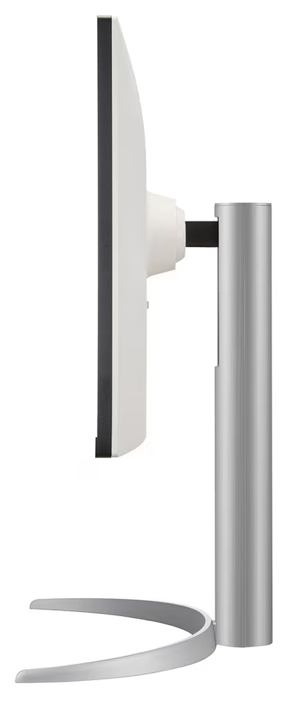 Widok z boku białego monitora komputerowego. Jest podparty srebrnym stojakiem na białym tle. Ekran jest czarny.