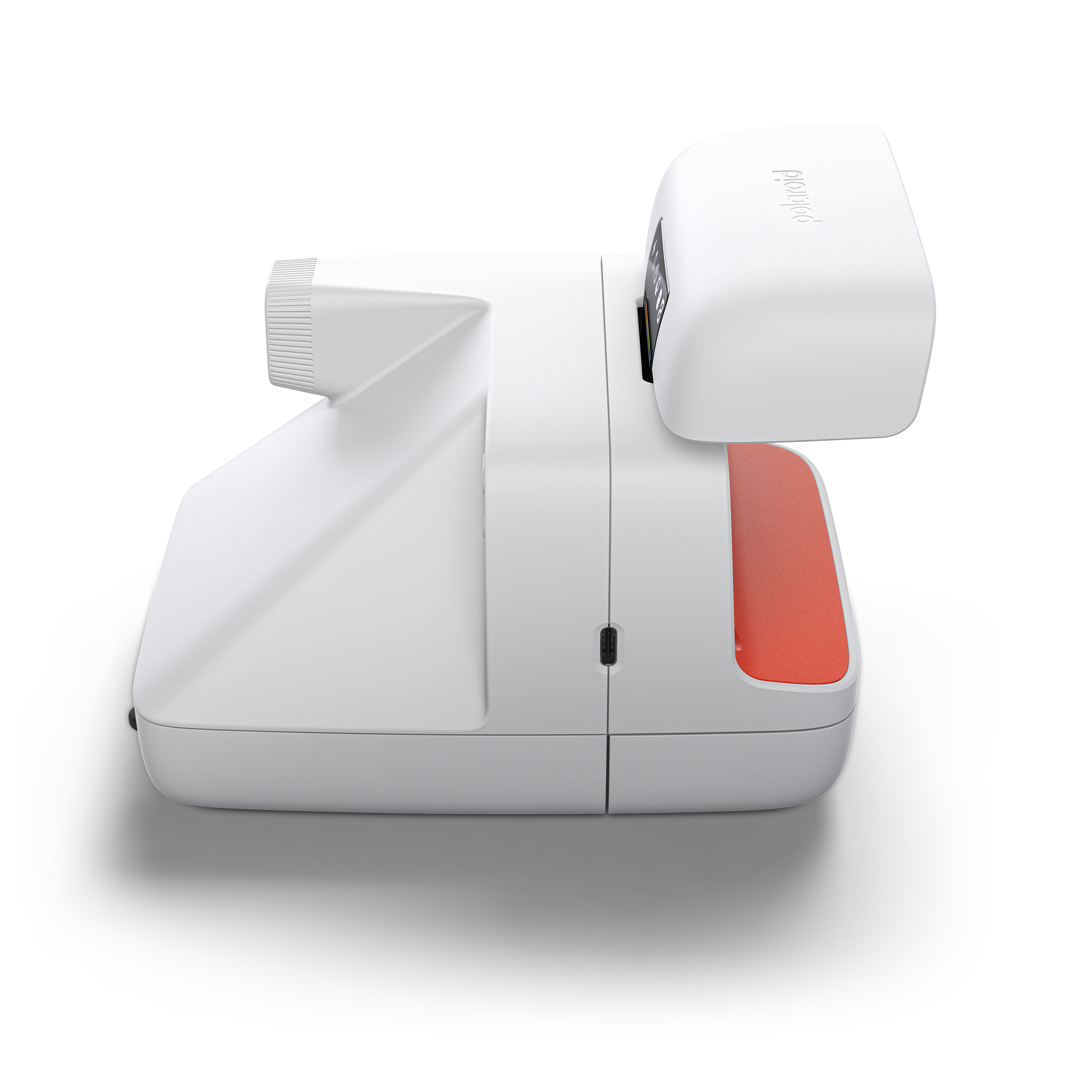 Siyah zemin üzerinde turuncu vurgulu beyaz bir Polaroid fotoğraf makinesi. Polaroid kelimesi kameranın üst kısmında yer almaktadır.