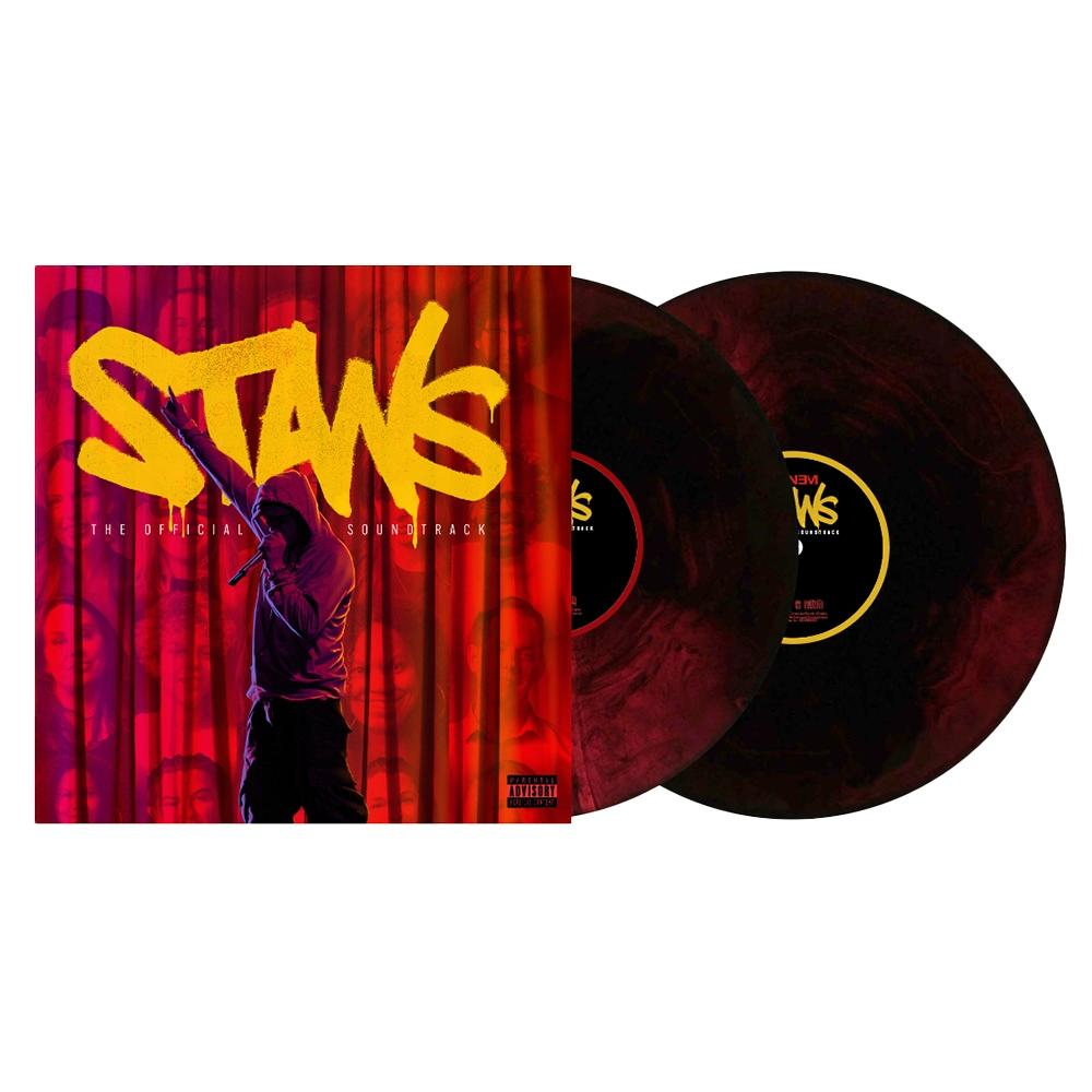 Albumhoes en vinylplaten. De hoes heeft "Stans" in geel en een figuur met capuchon die een microfoon vasthoudt.
