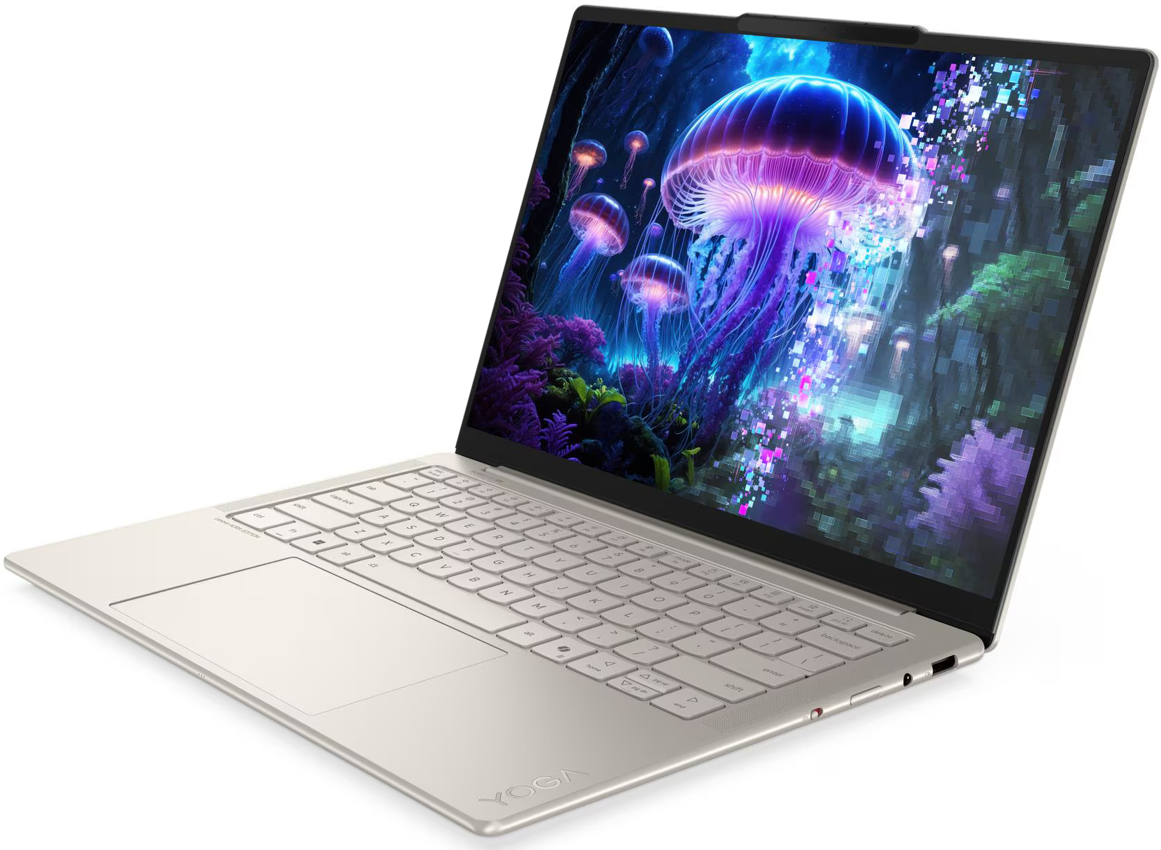 Egy ezüst laptop képernyőjén világító medúzák láthatók. A billentyűzet és a touchpad látható. A laptop fehér felületen van.