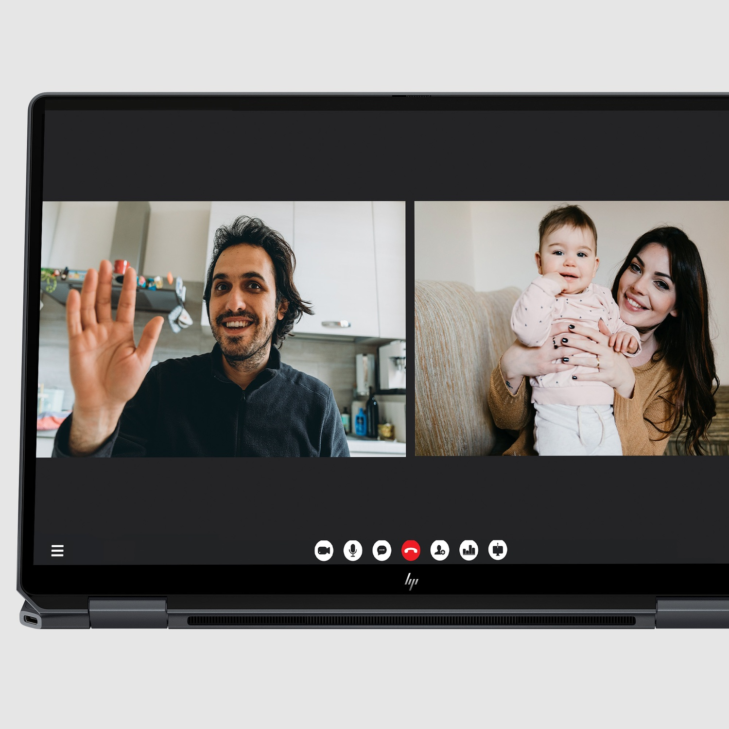 Video call. Man waves from kitchen. Woman holds baby on couch. Laptop screen displays the call. HP logo at bottom.