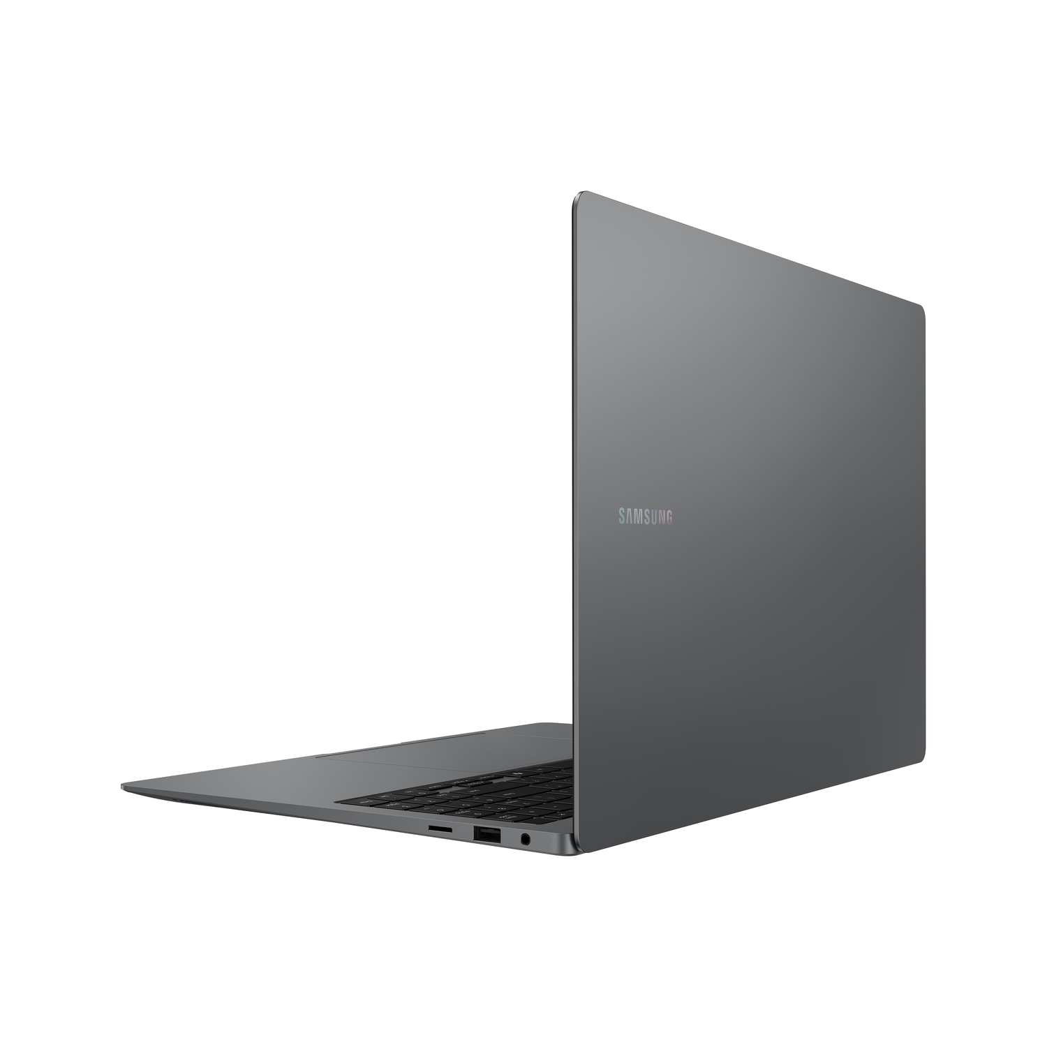 A gray Samsung laptop is slightly open on a white background. The screen is angled away, showing the Samsung logo.