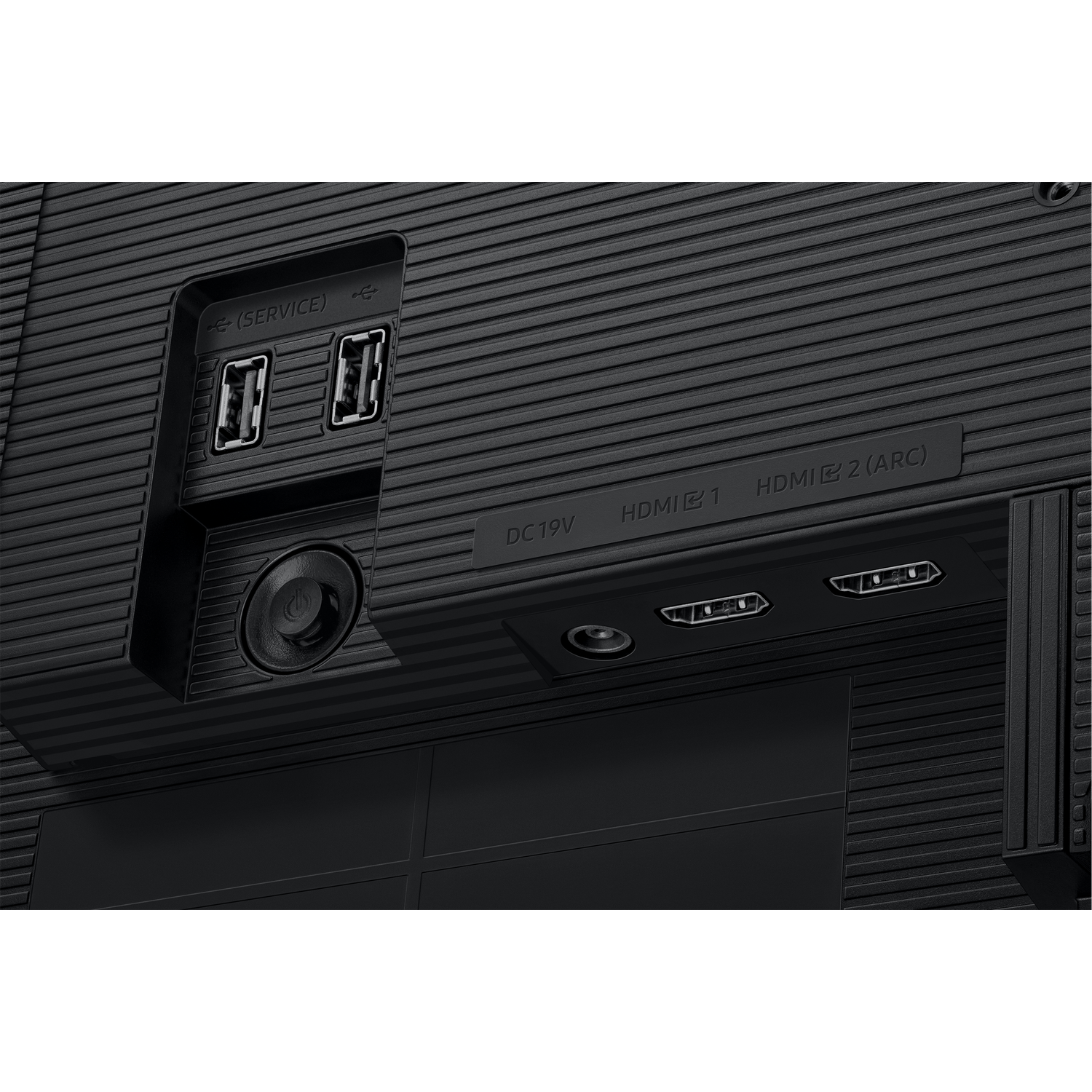 Close-up of a black monitor back with ports: HDMI, USB, DC19V, and a power button. The surface is textured with horizontal lines.
