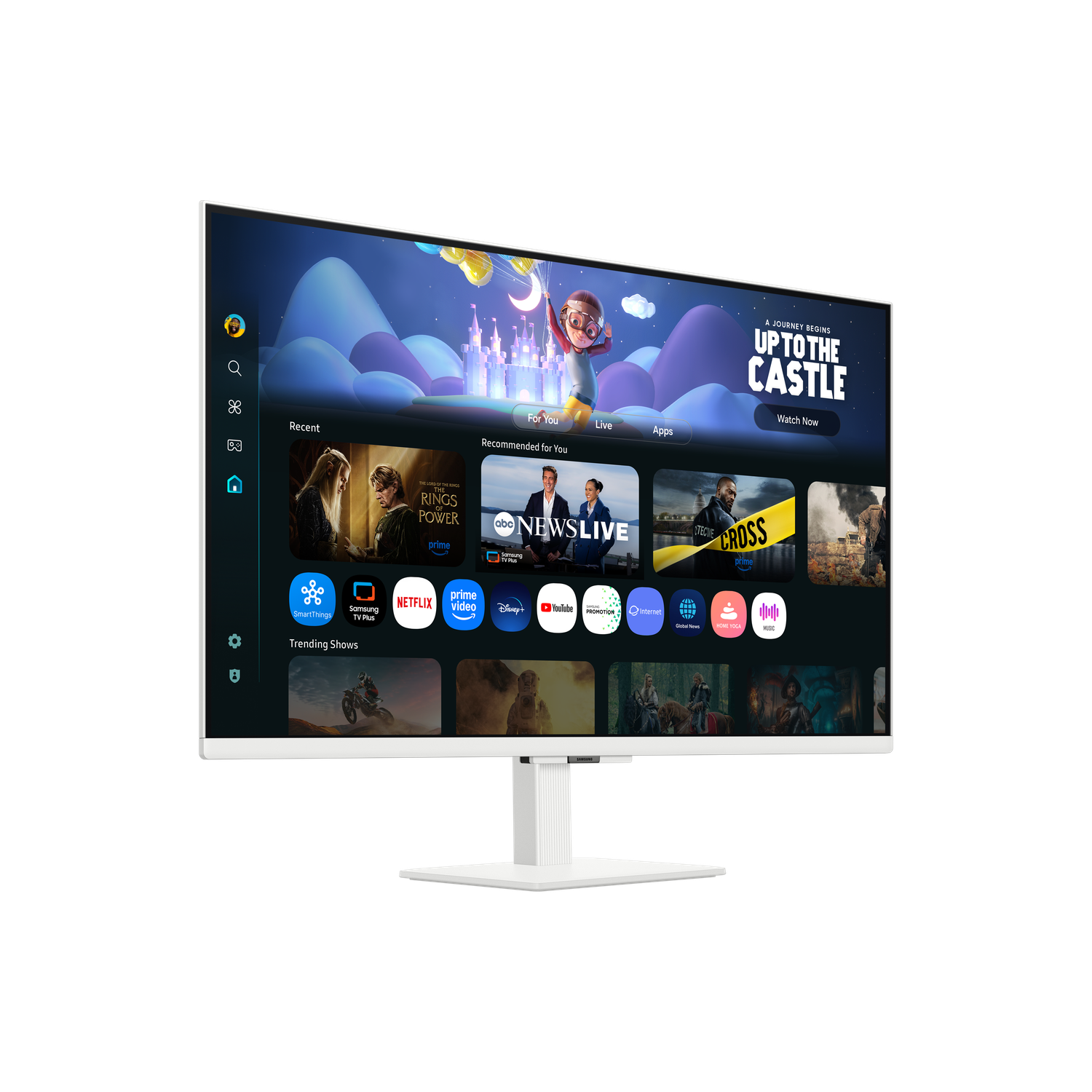 A white monitor displays a TV interface with app icons. Shows include 'The Rings of Power' and 'ABC News'. The background is black.