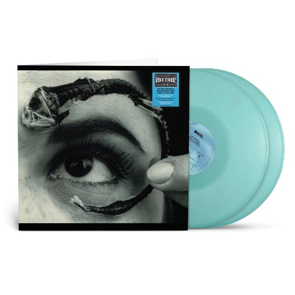 Albumcover zeigt ein Auge mit einem fischartigen Objekt. Zwei hellblaue Schallplatten sind rechts.