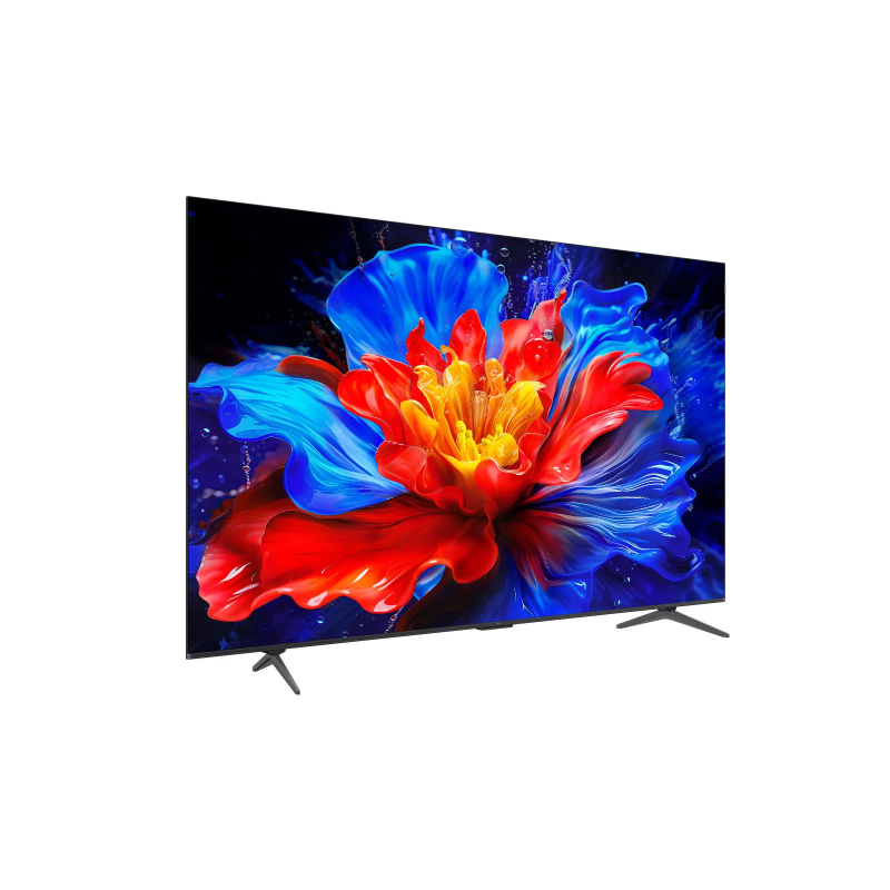 TV, kırmızı, mavi ve sarı renklerde canlı bir çiçek görüntüsü sergiliyor. TV siyah, iki siyah ayağı var ve beyaz bir arka plan üzerinde duruyor.
