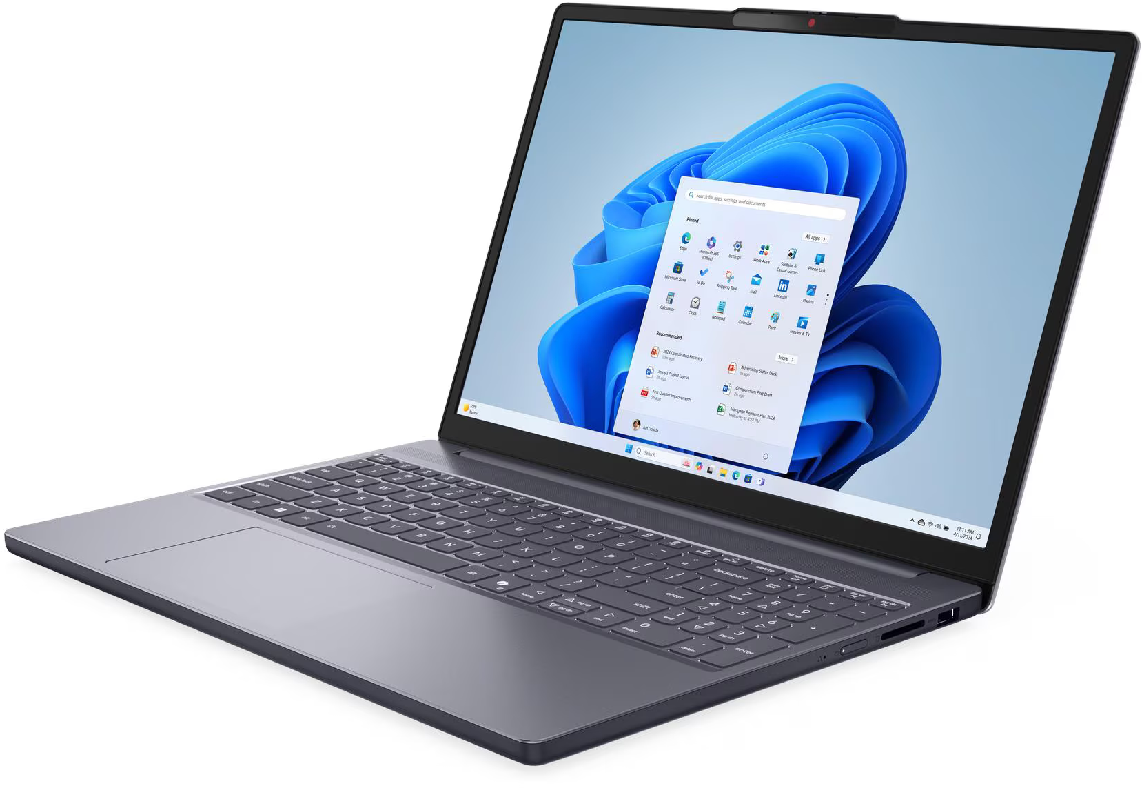 Egy szürke laptop Windows 11 felületet jelenít meg. A képernyőn alkalmazásikonok és a Start menü látható. A billentyűzet látható.