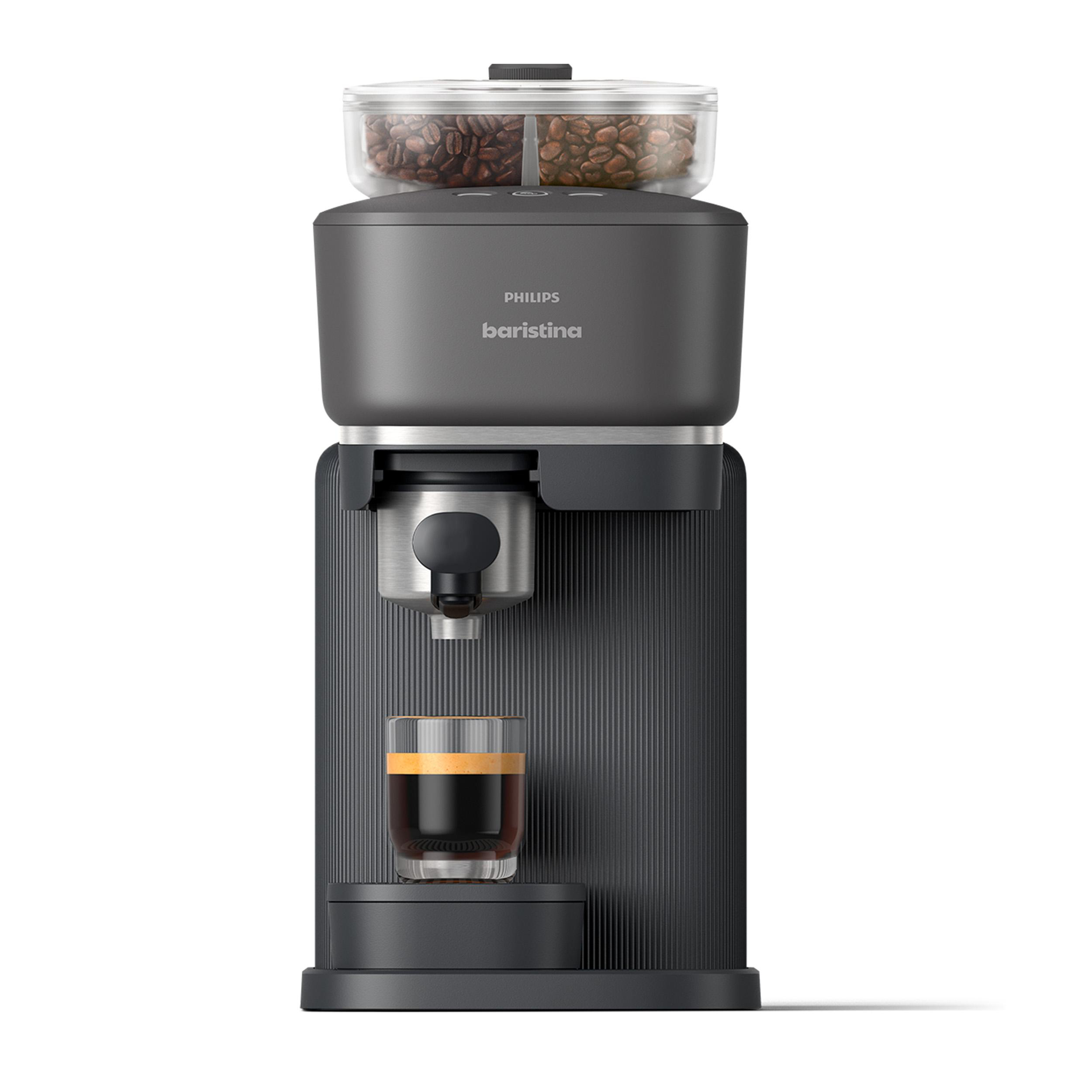 Eine schwarze Philips Baristina Espressomaschine mit einem Glas Kaffee. Sie hat einen Bohnenbehälter und einen Kaffeeauslauf.