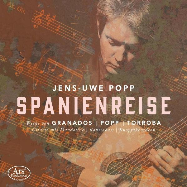 Albumcover zeigt einen Mann, der Gitarre spielt, überlagert mit Noten. Titel ist 'SPANIENREISE' von Jens-Uwe Popp. Brauner Hintergrund.