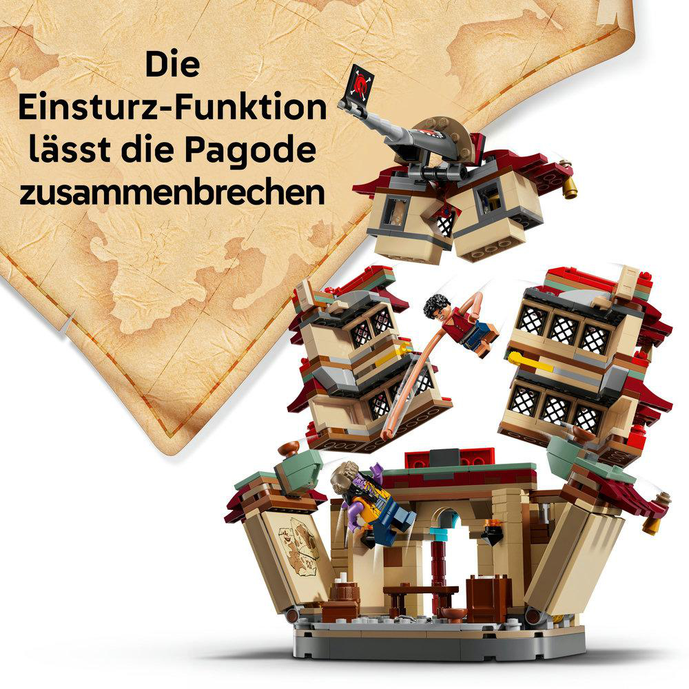 Lego-Set, das einen einstürzenden Pagoden-Turm darstellt. Mehrere Lego-Figuren fallen, im Hintergrund ist eine Karte zu sehen.