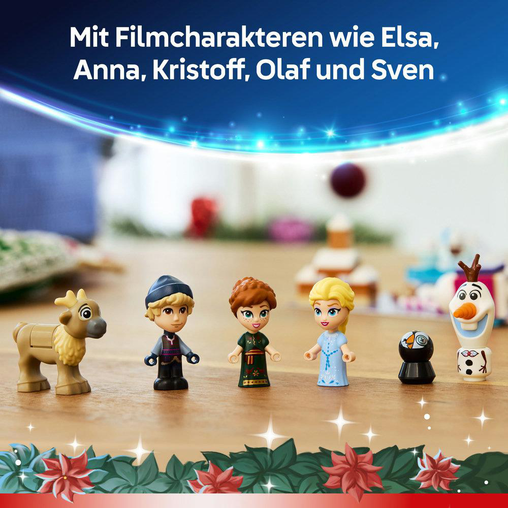 Das Bild zeigt Frozen-Charaktere: Sven, Kristoff, Anna, Elsa, Olaf. Es sind kleine Figuren auf einer Holzoberfläche mit festlichem Rand.