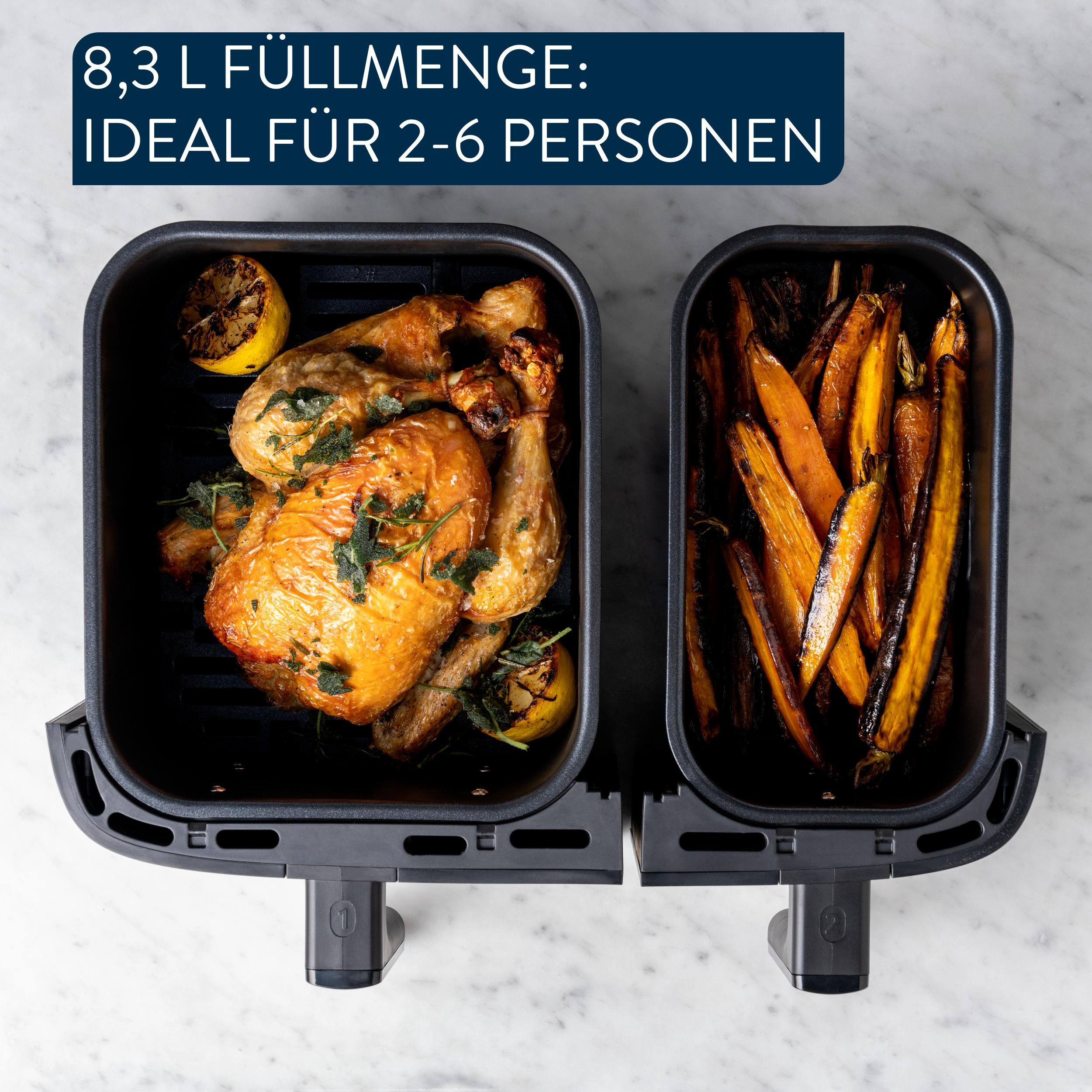 Ein Luftfritteuse enthält gekochtes Hühnchen mit Zitrone und Karotten. Text: 8,3L Volumen, ideal für 2-6 Personen.