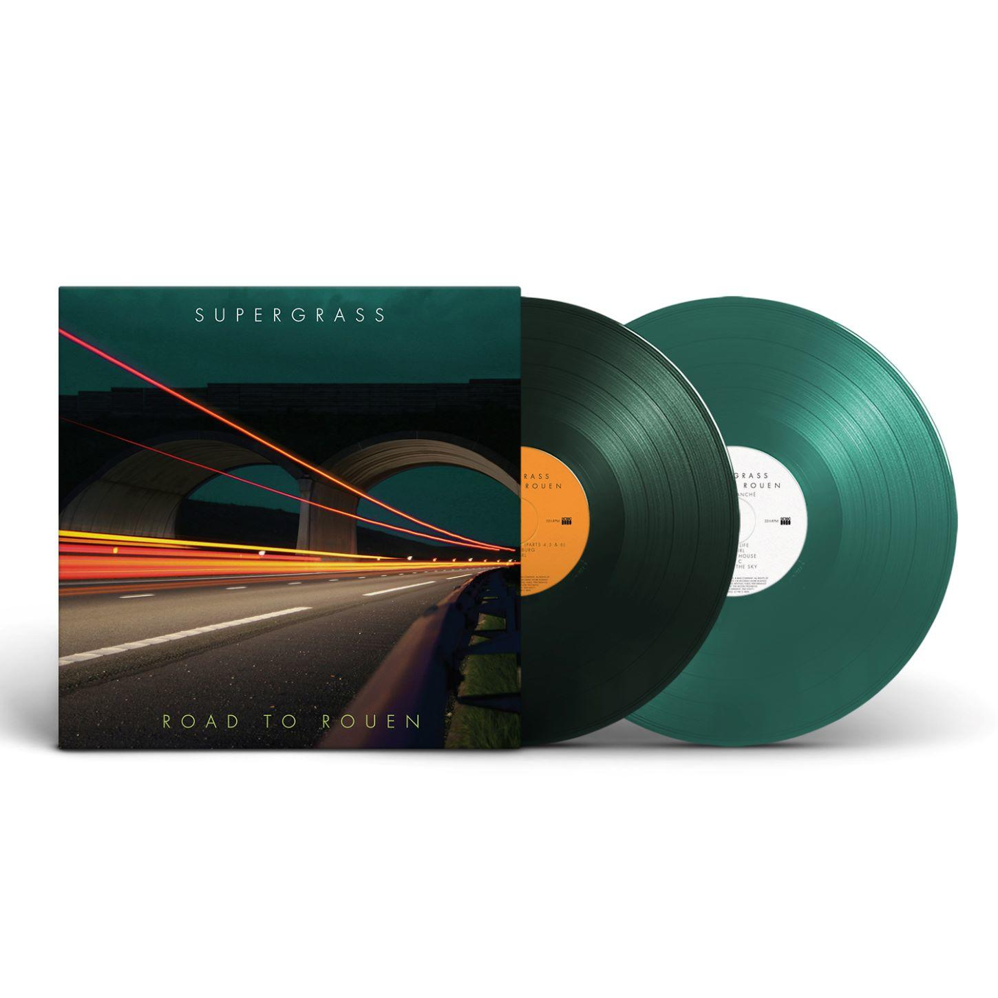 Albumcover "Road to Rouen" von Supergrass. Zeigt eine Straße mit Lichtspuren, Album und Schallplatten in Grün und Schwarz.