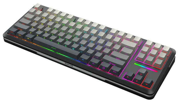 Klawiatura mechaniczna z szarymi i białymi klawiszami. Klawisze są podświetlane kolorami tęczy.