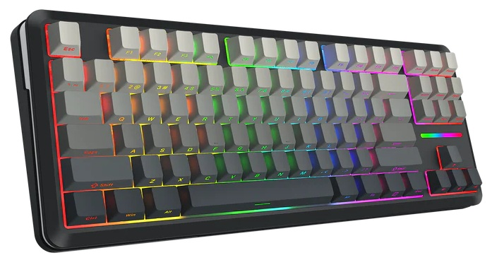 Czarna i szara klawiatura mechaniczna z podświetlanymi klawiszami. Tęczowe podświetlenie otacza podstawę. Klawisze są szare i czarne.