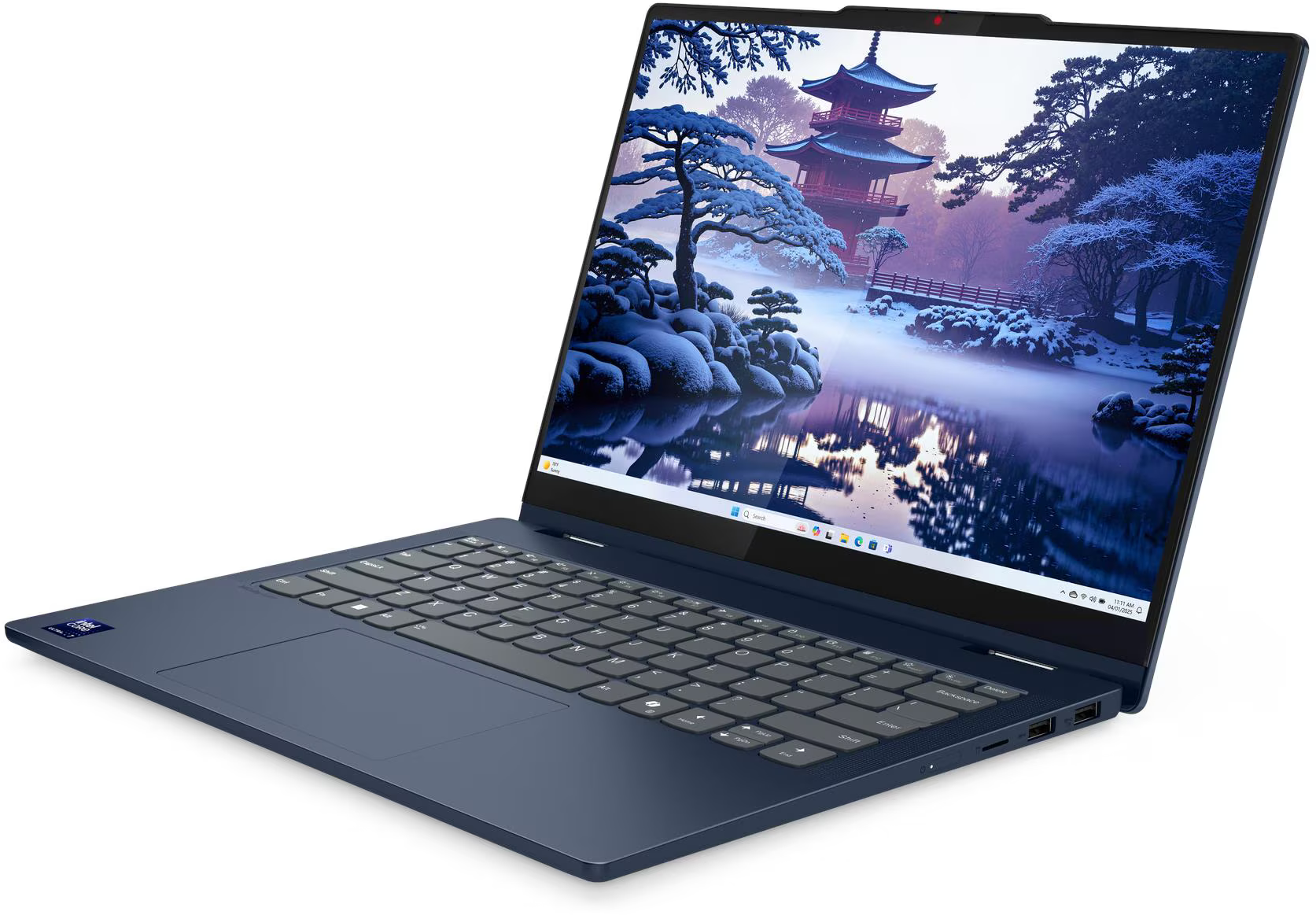 Egy kék laptop nyitva van, japán tájképet mutat. A billentyűzet a fókuszban van, a képernyő téli jelenetet mutat.