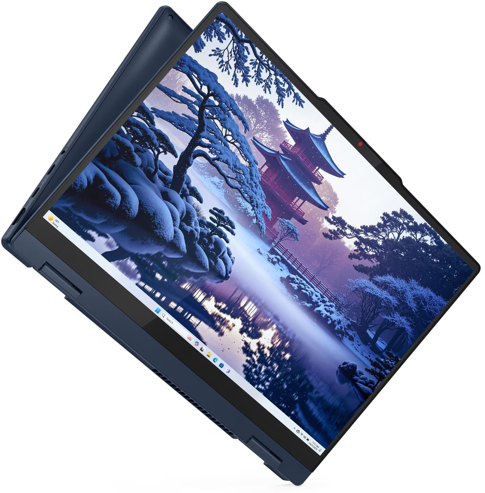 Egy kék laptop téli tájat mutat, hófödte fákkal, egy piros pagodával és egy nyugodt tóval.