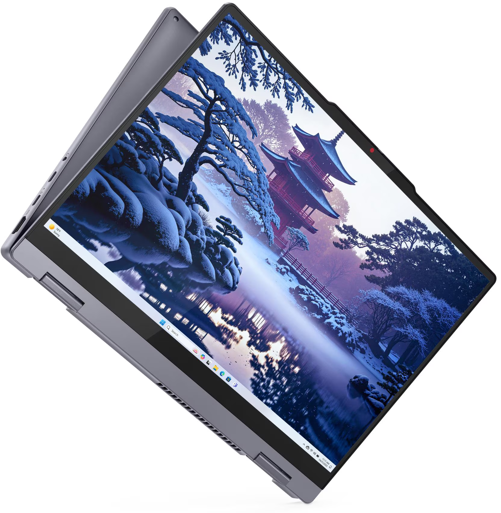 Laptop téli jelenettel: pagodák, havas fák és tükröződő tó. A laptop nyitva van.