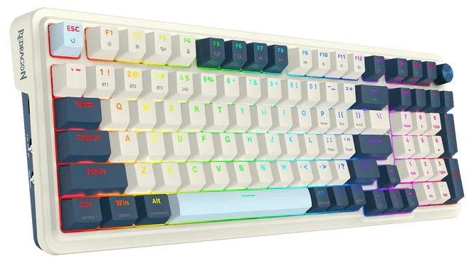 Biała klawiatura mechaniczna z ciemnoniebieskimi i białymi nakładkami na klawisze. Klawisze są podświetlane w kolorach tęczy.