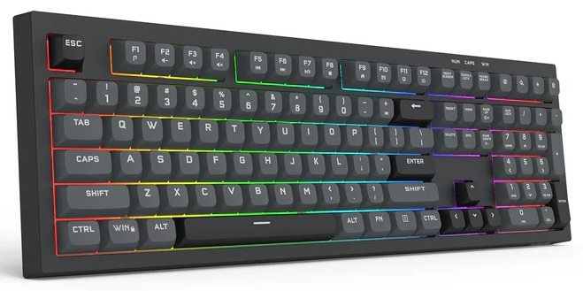 Czarna klawiatura mechaniczna z podświetleniem RGB. Klawisze są szare, z literami i symbolami. Rama jest czarna.