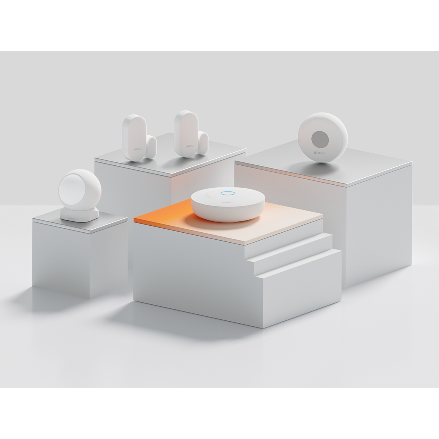 White security devices on white platforms. Includes motion sensors, a hub, and a camera. Orange and beige accents on one platform.
