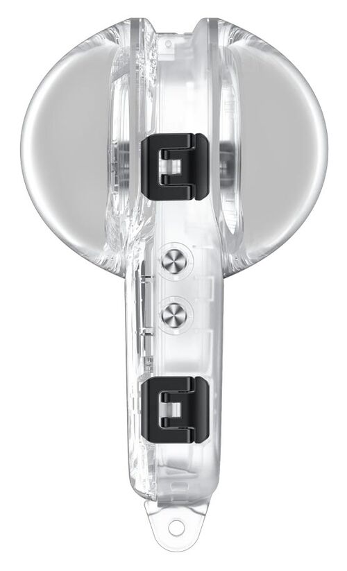 Dispositivo de plástico transparente con dos clips negros y dos botones plateados. Parte superior redondeada y mango alargado.