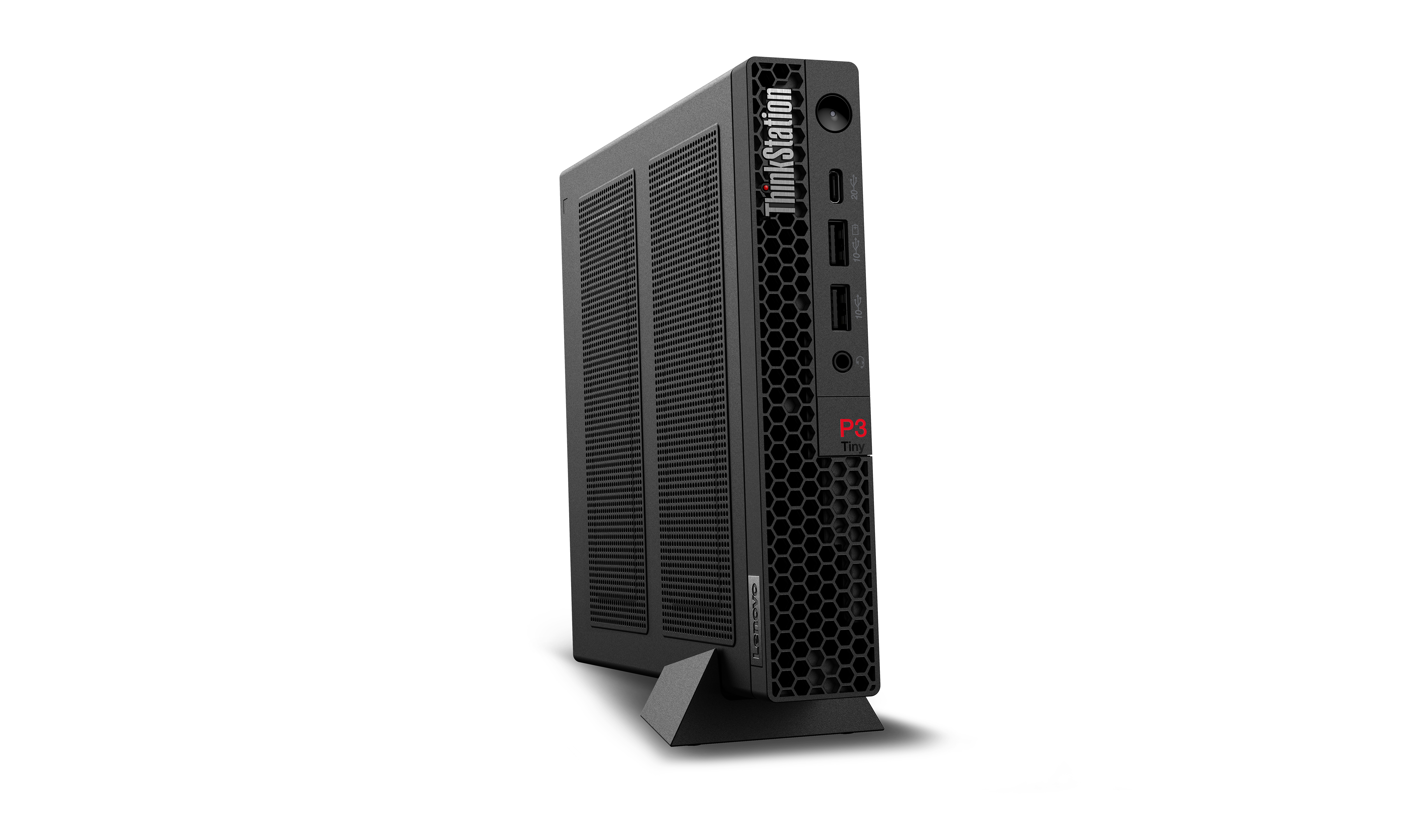 Ein schwarzer Lenovo ThinkStation P3 Tiny Desktop-Computer steht auf einer schwarzen Oberfläche vor schwarzem Hintergrund.