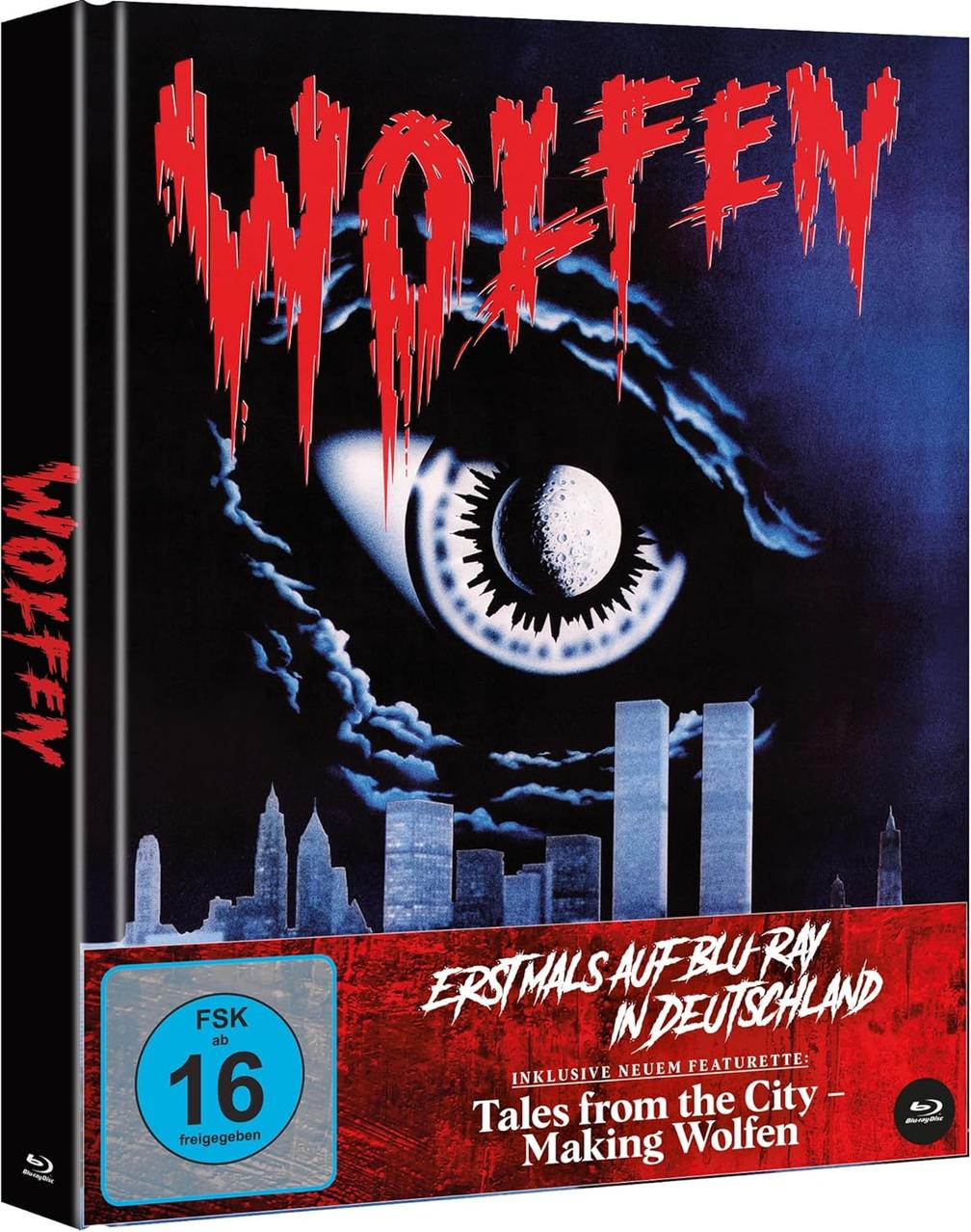 Blu-ray-Cover für Wolfen. Auge mit Mond in der Mitte, Stadtsilhouette, roter Titeltext und deutscher Text.