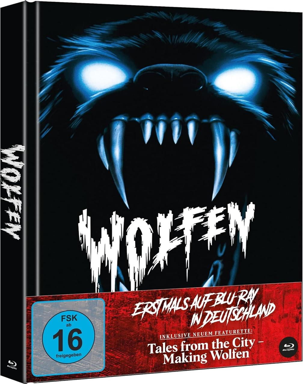 Blu-ray-Cover. Ein Wolfsgesicht mit leuchtenden Augen und Fangzähnen. Der Titel "Wolfen" ist prominent. Das Cover zeigt auch die Altersfreigabe.