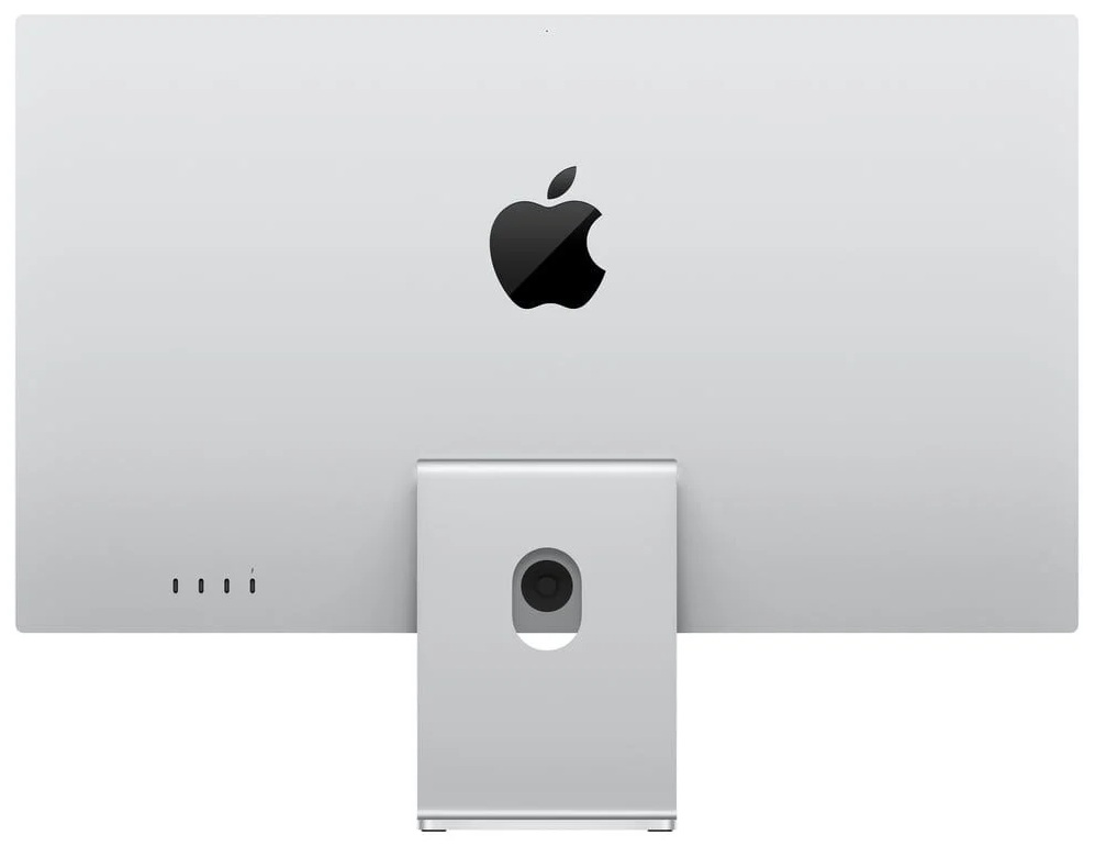 Tył iMaca. Srebrna ramka, czarne logo Apple. Stojak srebrny z czarnym okręgiem. Cztery małe kropki po lewej stronie.