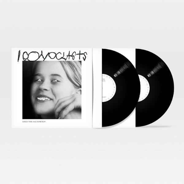 Albumcover mit Schwarz-Weiß-Bild einer Frau und dem Wort Iconoclasts. Rechts befinden sich zwei Schallplatten.