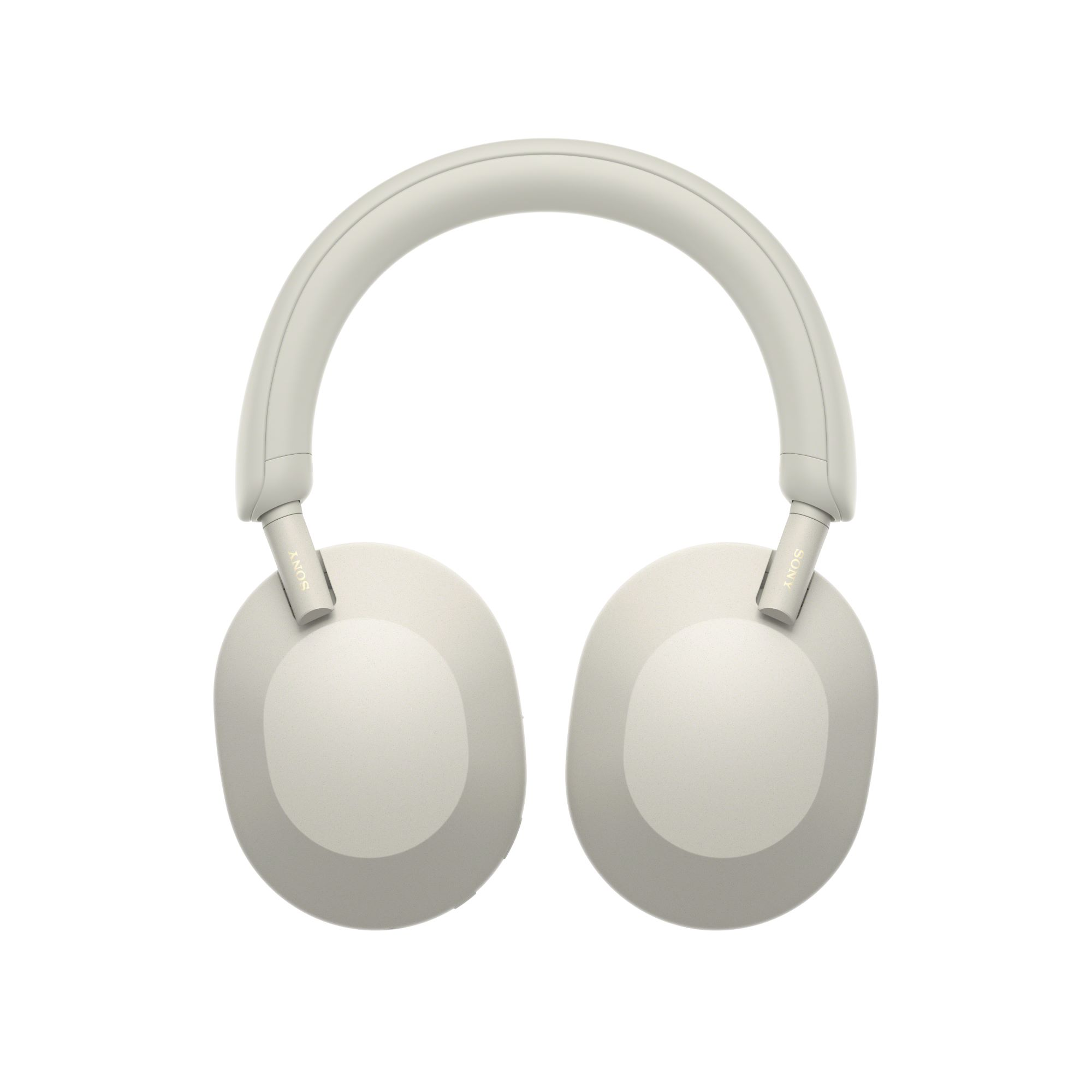 Auriculares Sony color crema sobre fondo blanco. Los auriculares tienen una diadema y orejeras acolchadas. El logotipo de Sony es visible.