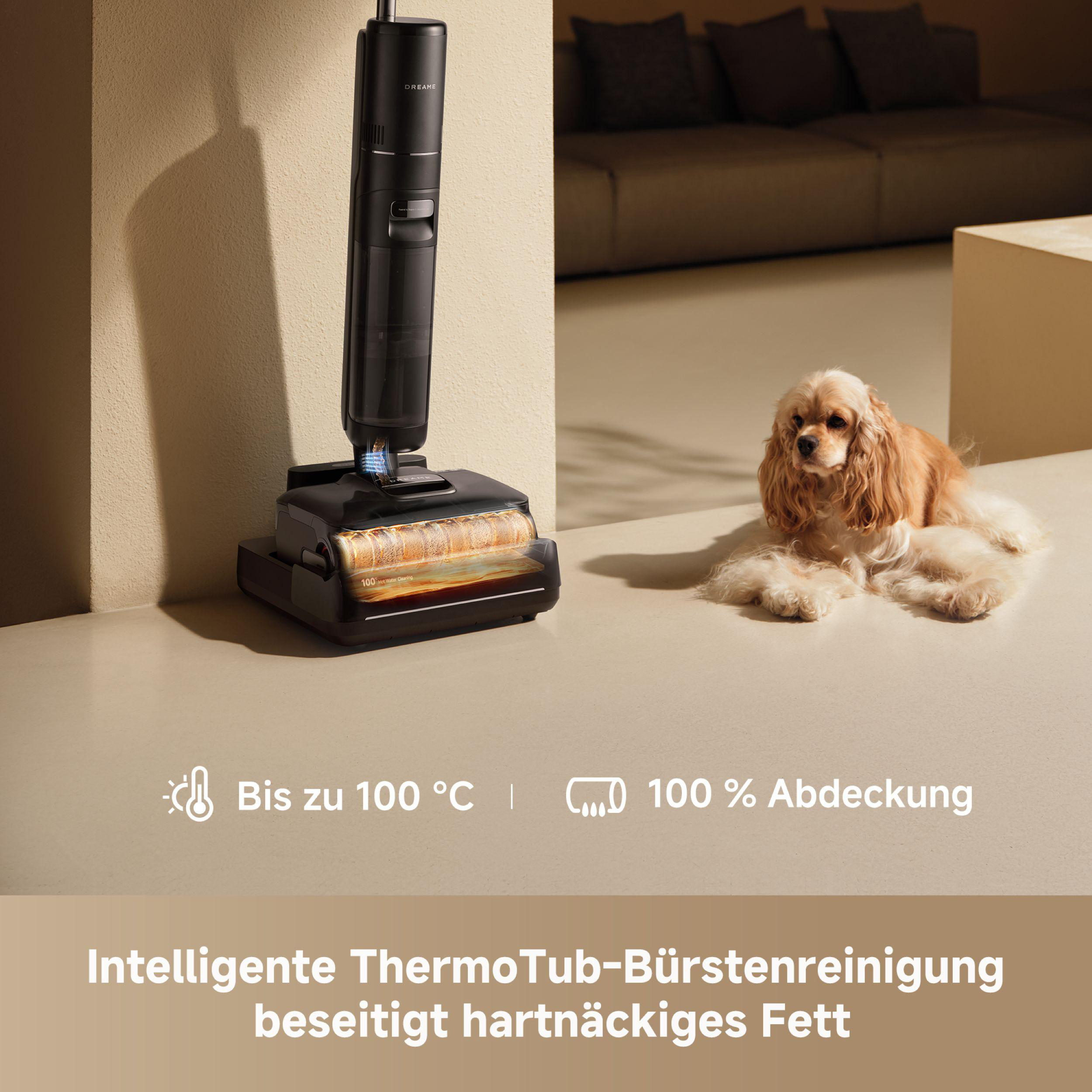 Ein schwarzer Staubsauger steht auf dem Boden. Ein brauner Hund liegt daneben. Text: 100% Abdeckung und bis zu 100°C.