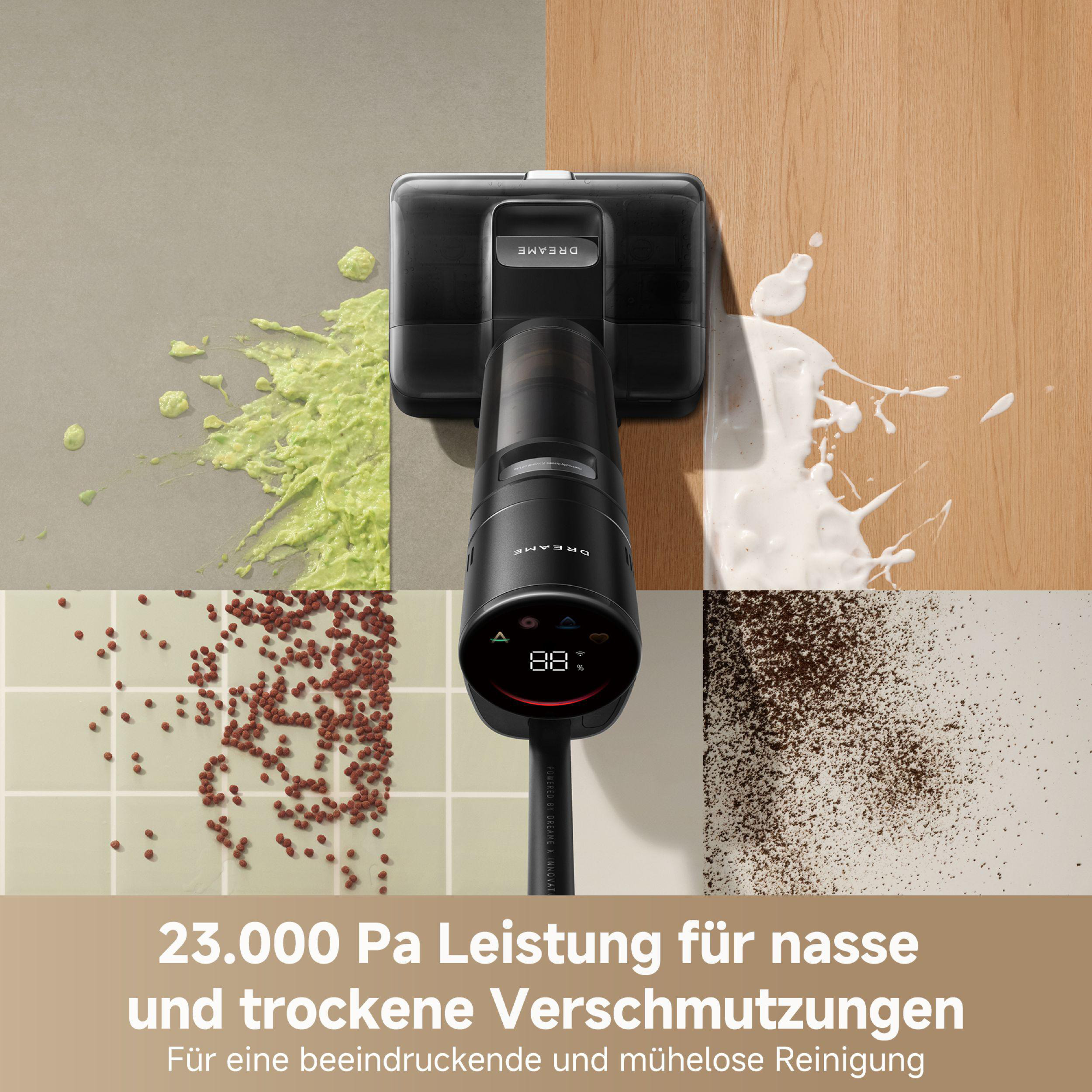 Ein Staubsauger mit schwarzem Gehäuse. Vier Abschnitte zeigen Verschmutzungen: grün, weiß, rote Kügelchen und braunes Pulver.