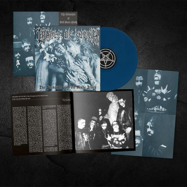 Albumcover mit blauer Vinyl und Einsätzen. Zeigt Bandmitglieder mit Make-up und Albumkunst mit Illustrationen und Text.