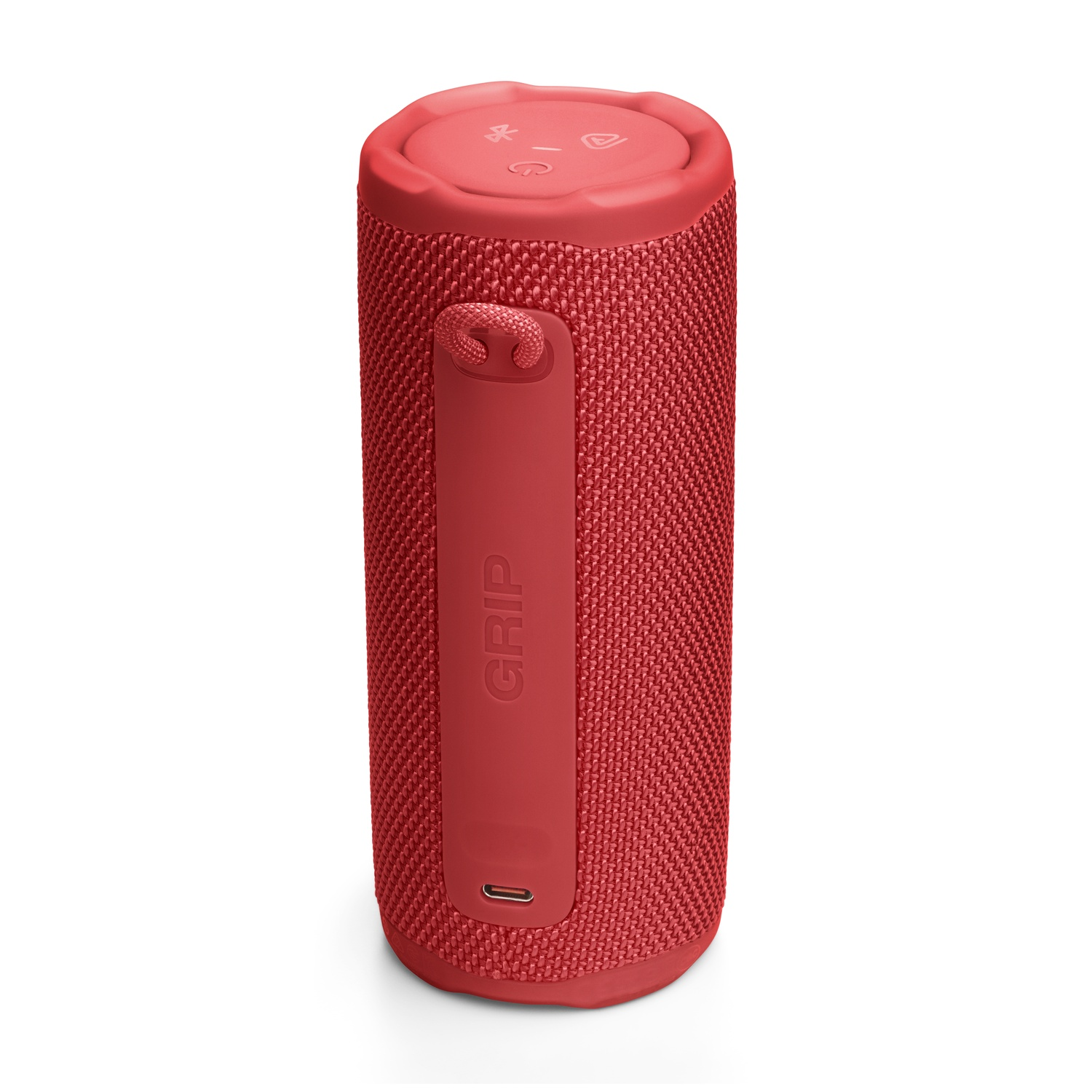 Un haut-parleur cylindrique rouge avec le mot 'GRIP'. Il a des commandes sur le dessus et une boucle sur le côté.