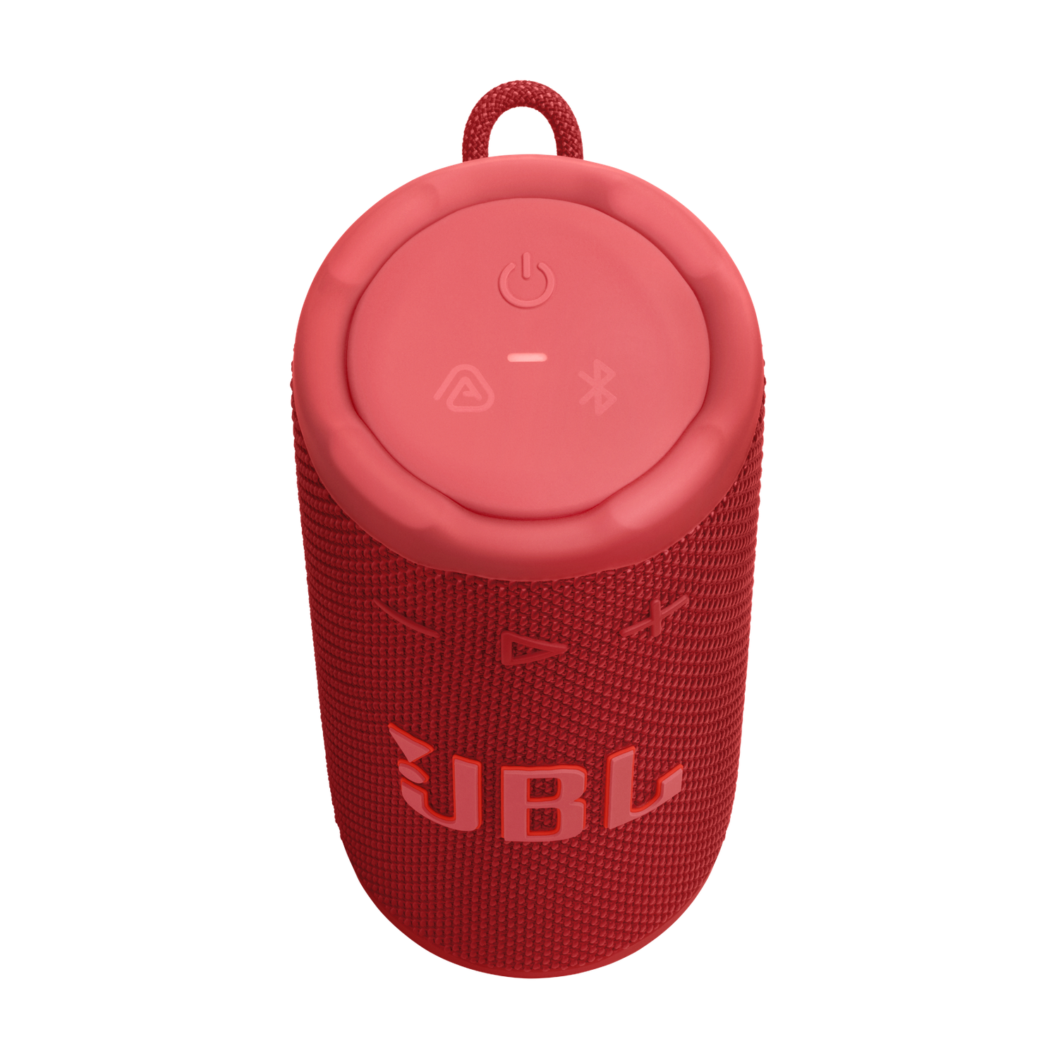 Un haut-parleur portable JBL rouge avec des boutons de commande sur le dessus. Le haut-parleur a une texture en tissu et une boucle. Fond noir.