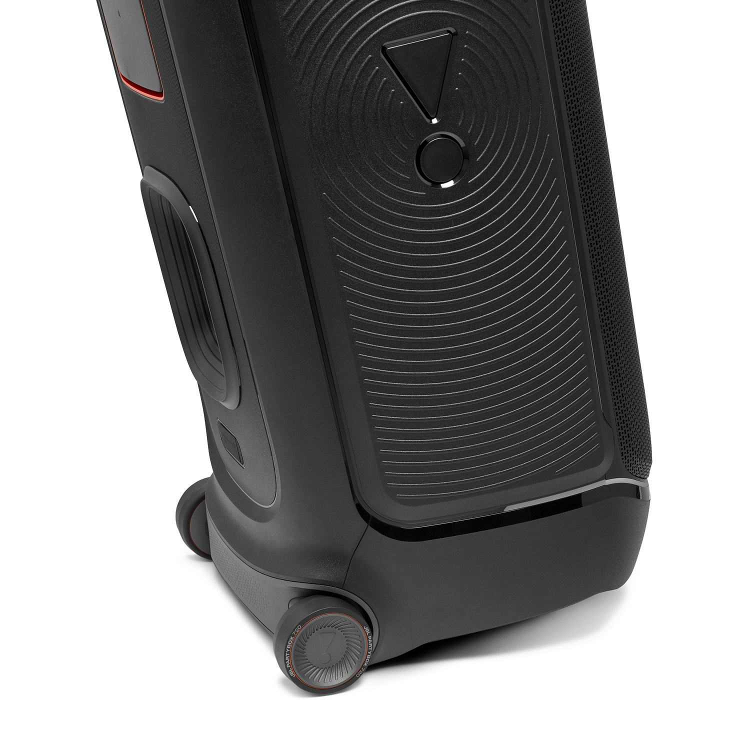 A black speaker on wheels. The speaker has a textured surface, a control panel, and the JBL logo. The wheels are visible.