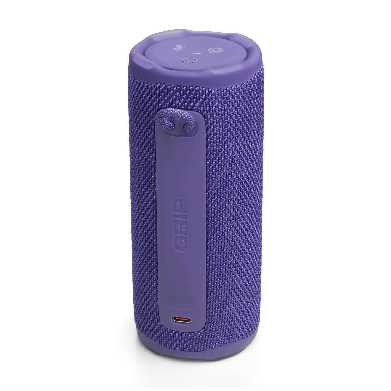 Un haut-parleur cylindrique violet avec une texture semblable à du tissu. Il a une poignée et un port, sur fond blanc.