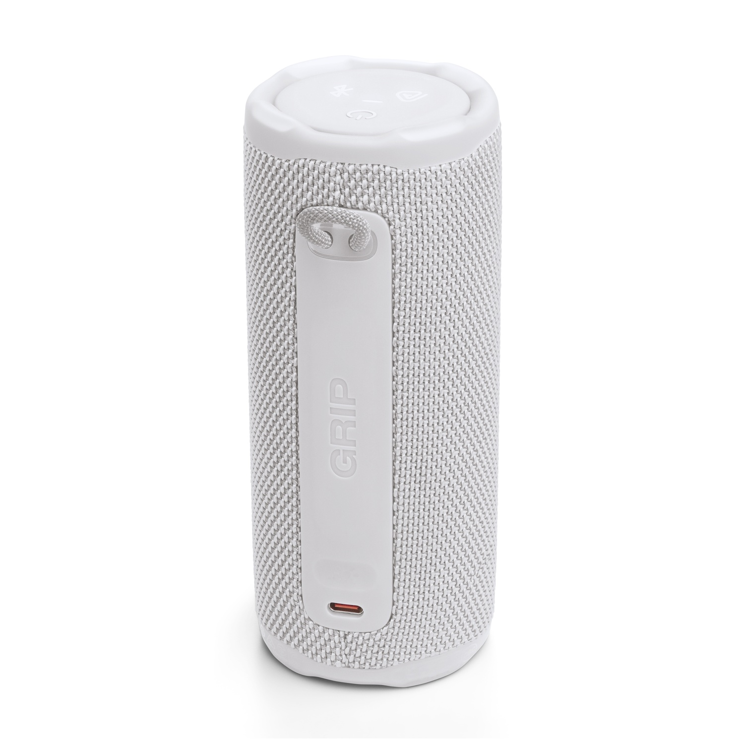 Un haut-parleur portable cylindrique blanc avec une surface en maille et une poignée. Il porte le mot 'GRIP' imprimé verticalement et un port de charge.