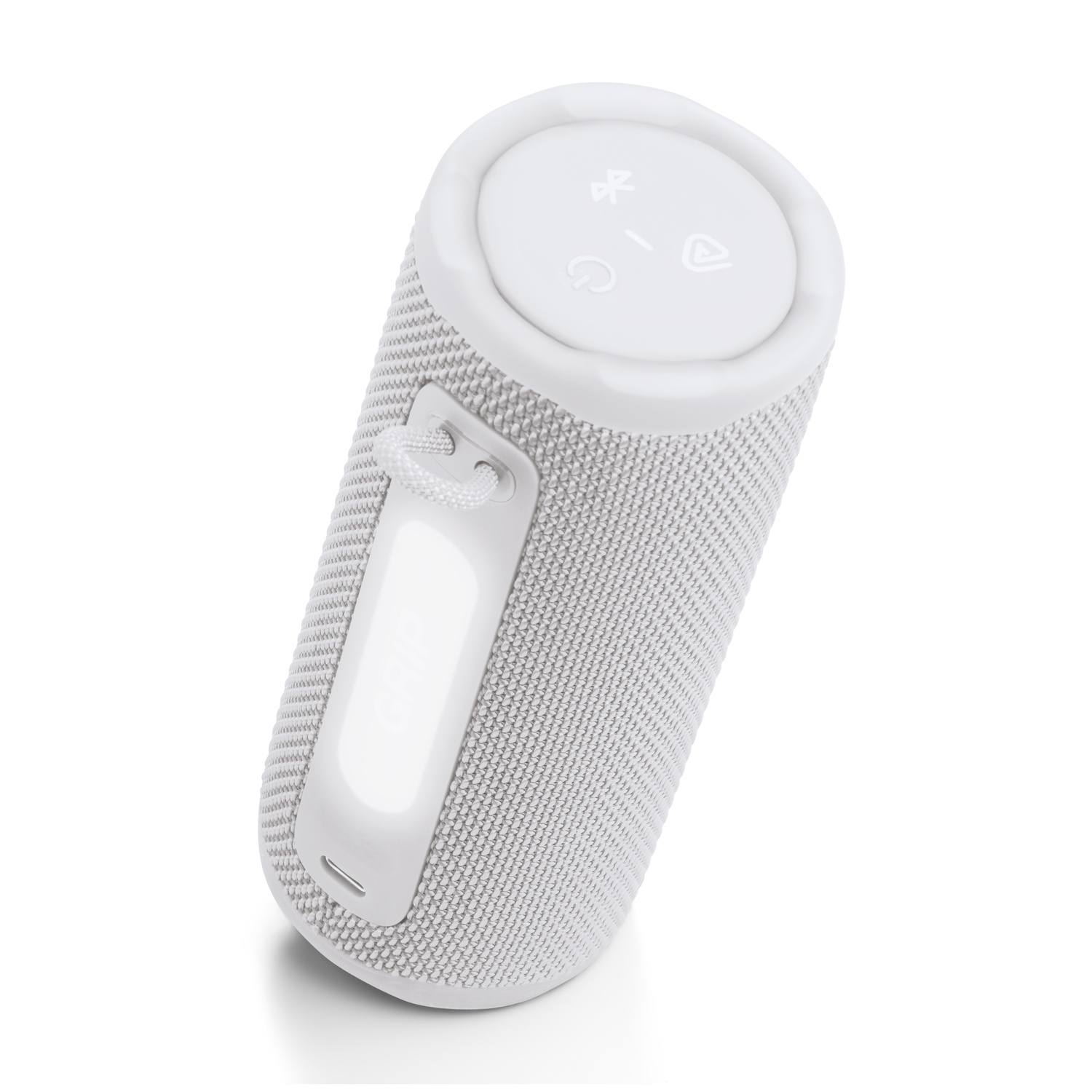 Un haut-parleur Bluetooth cylindrique blanc avec un corps en maille de tissu et un dessus blanc avec des symboles de contrôle. Une poignée blanche sur le côté.