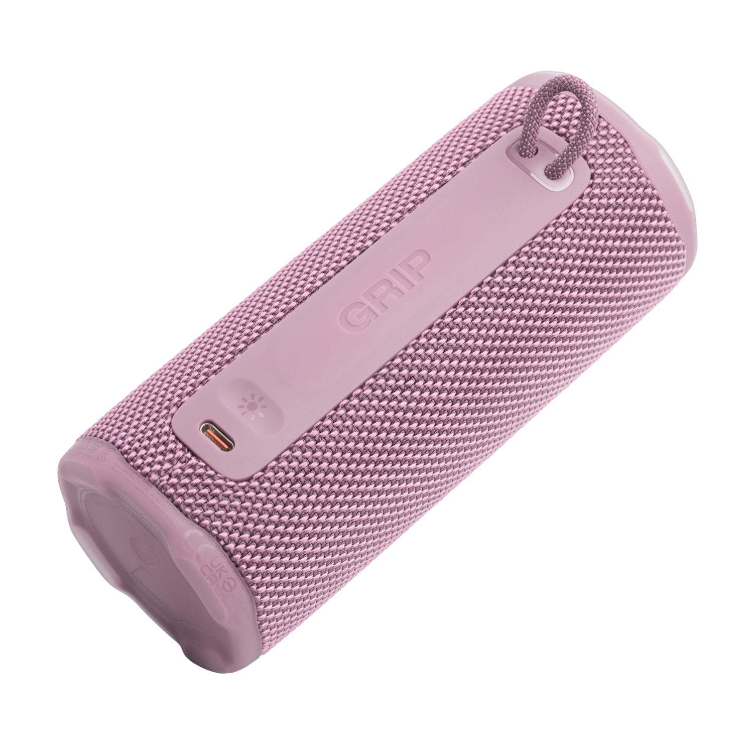 Pink cylindrical speaker. Features a fabric mesh, a handle, and a rubber grip with the word "GRIP" on it. USB-C port is visible.