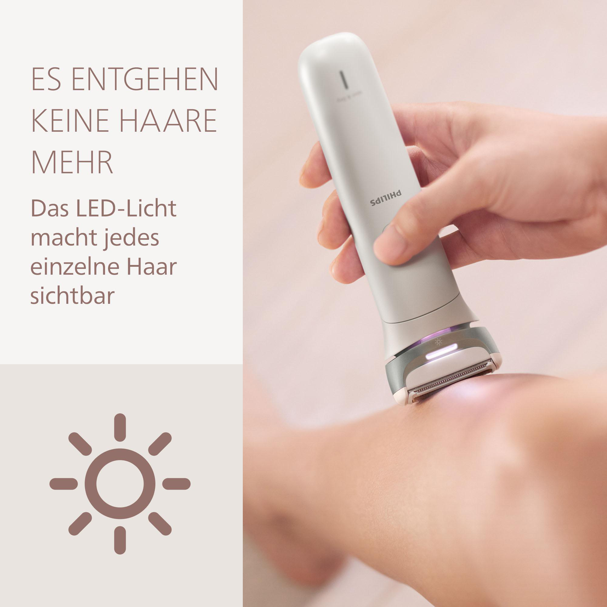 Eine Person rasiert ihr Bein mit einem Philips-Gerät. Das Gerät hat ein LED-Licht. Text auf Deutsch: Keine Haare mehr verpassen.
