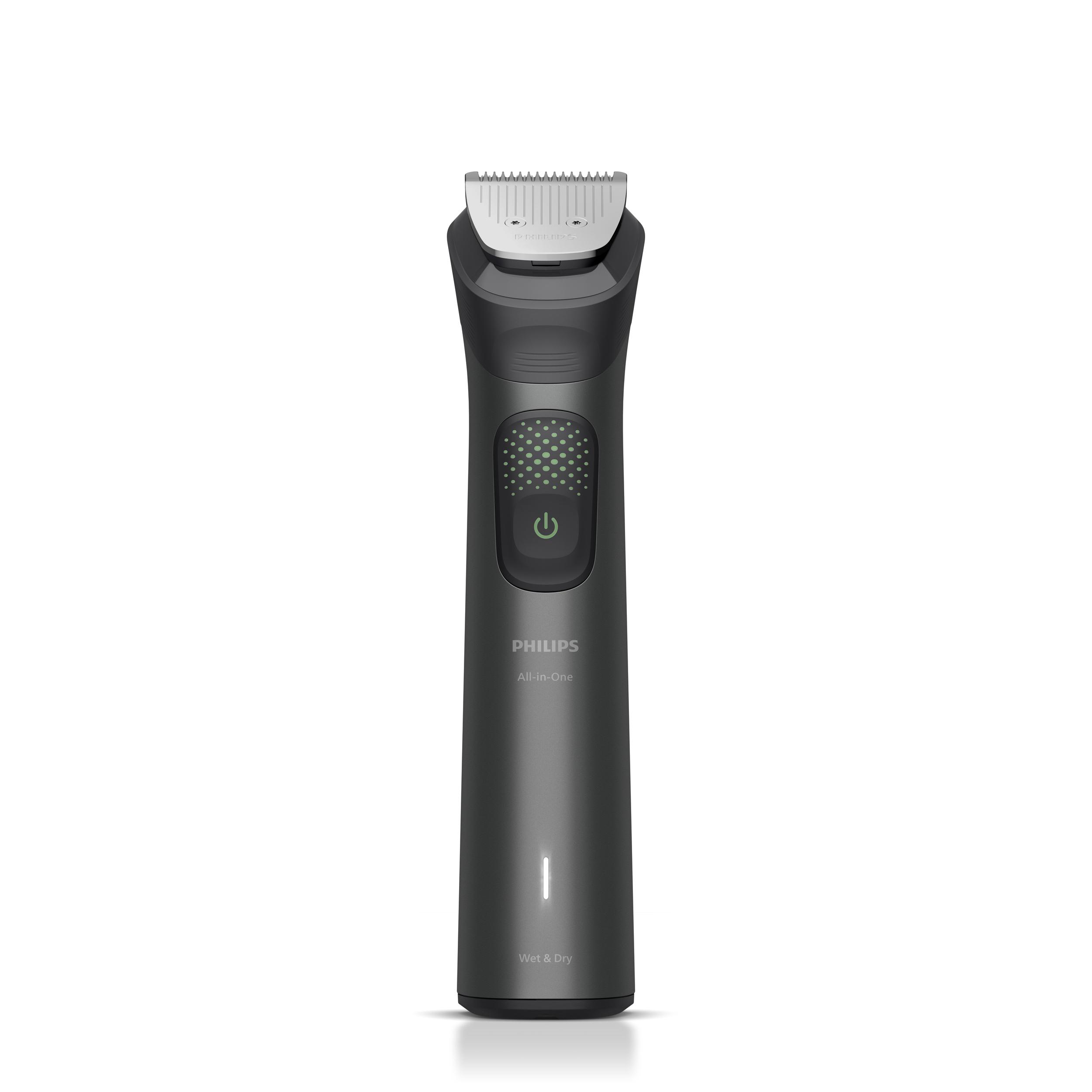Ein Philips All-in-One Trimmer. Er ist dunkelgrau, mit einer silbernen Klinge und einem grünen Ein/Aus-Knopf.